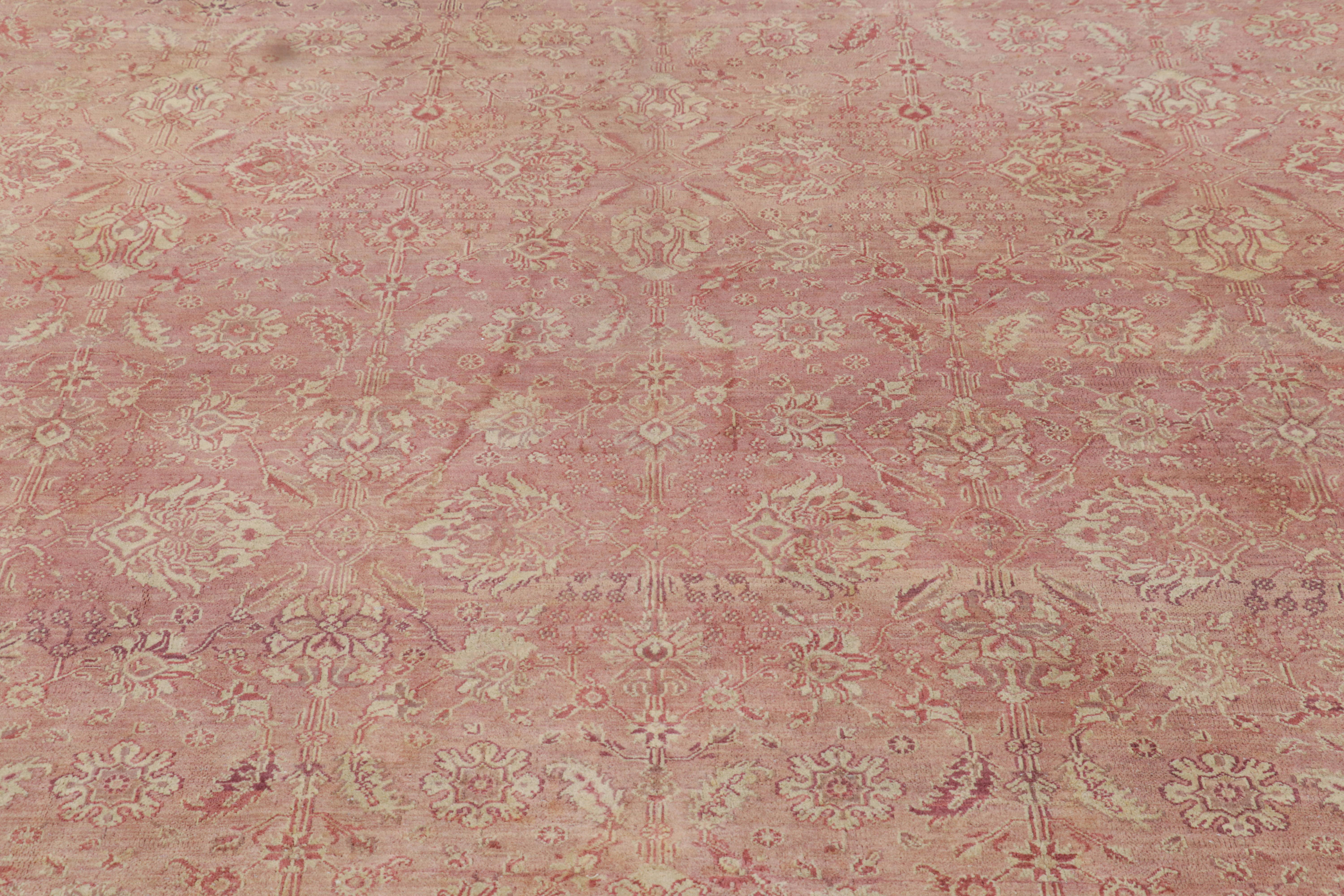 Indian Antique Agra Rug in Pink and Cream Floral Patterns For Sale
