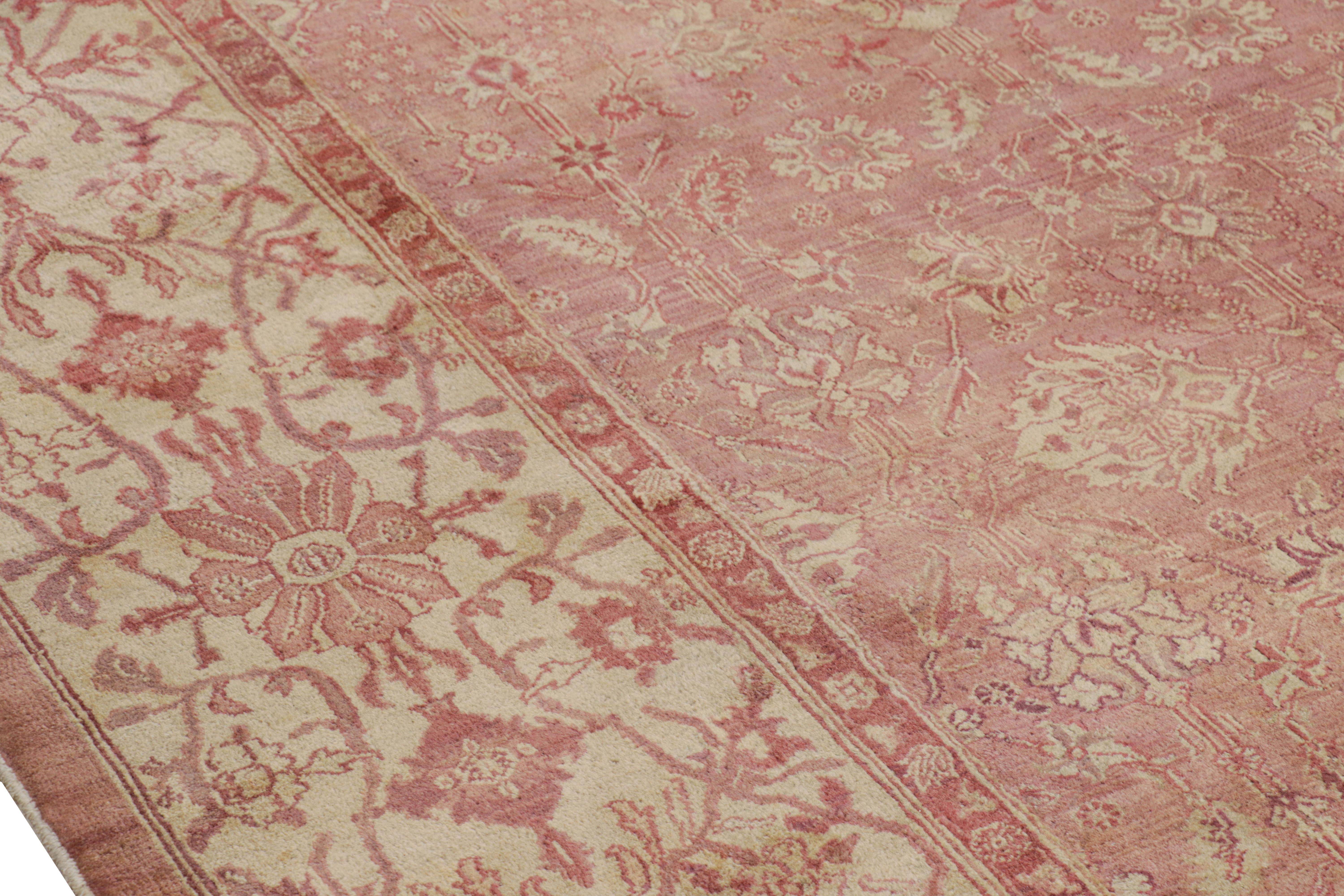 Hand-Knotted Antique Agra Rug in Pink and Cream Floral Patterns For Sale