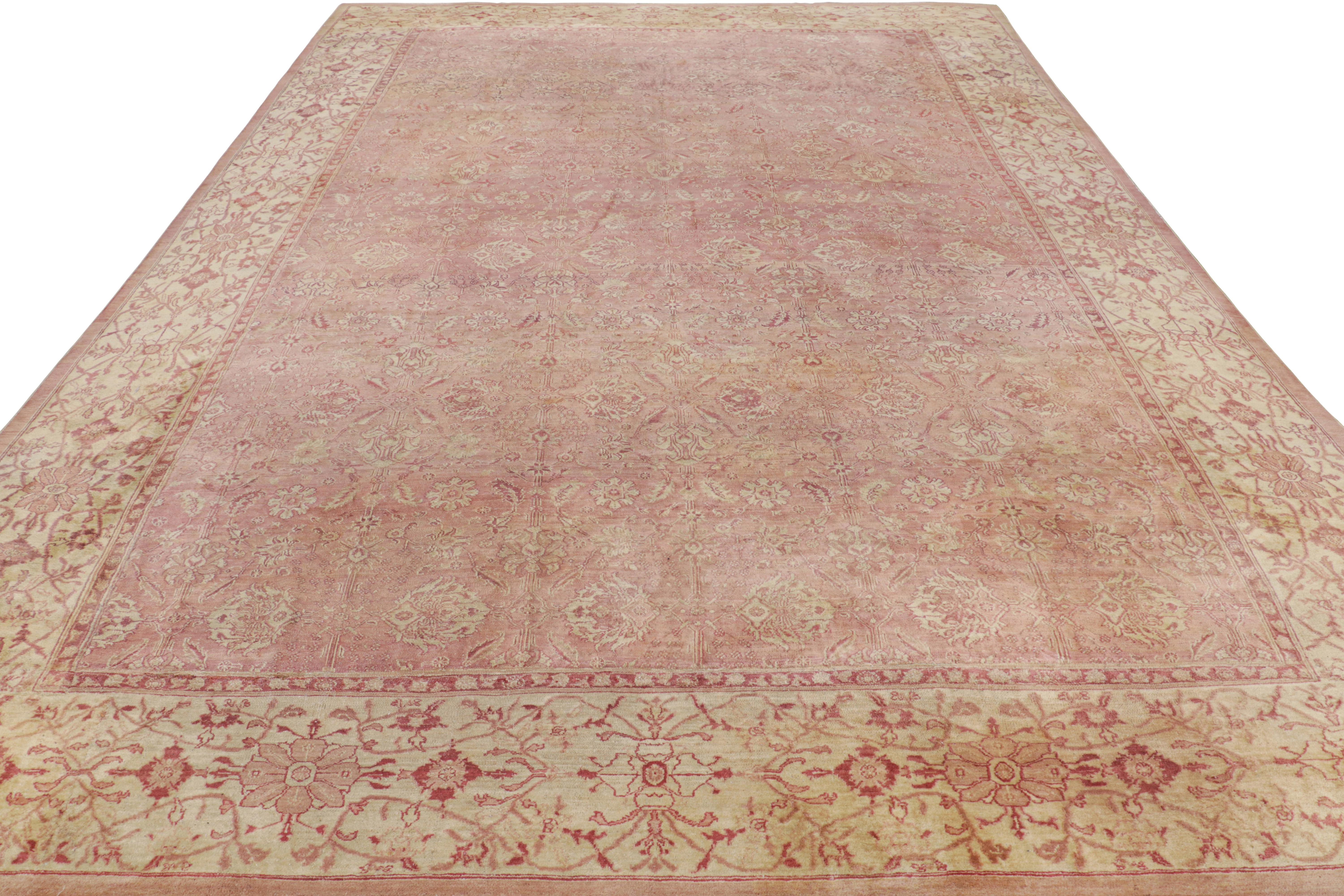 Antique Agra Rug in Pink and Cream Floral Patterns In Good Condition For Sale In Long Island City, NY