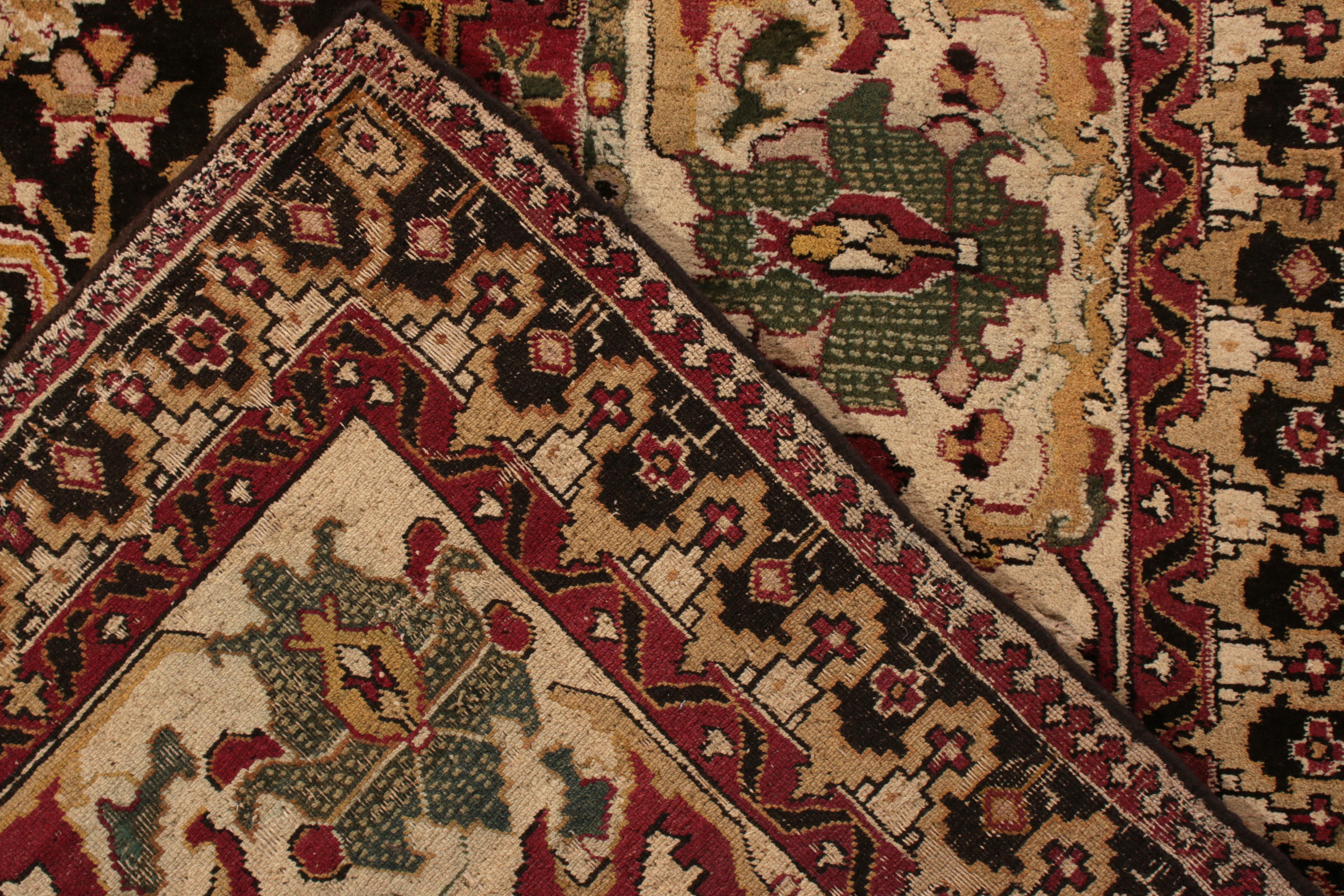 Antique Agra Rug in Black with Red and Gold Floral Patterns In Good Condition For Sale In Long Island City, NY