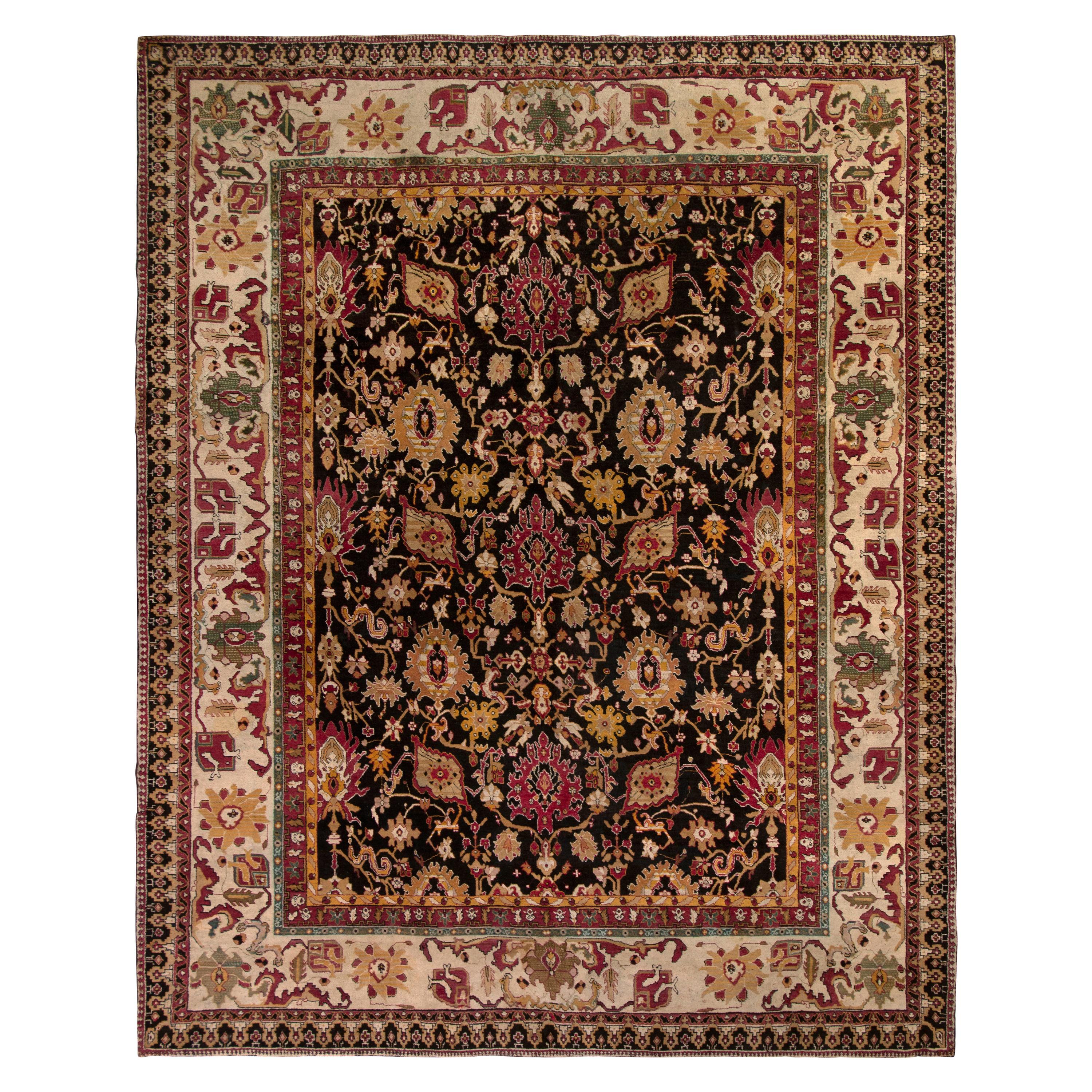 Antique Agra Rug in Black with Red and Gold Floral Patterns