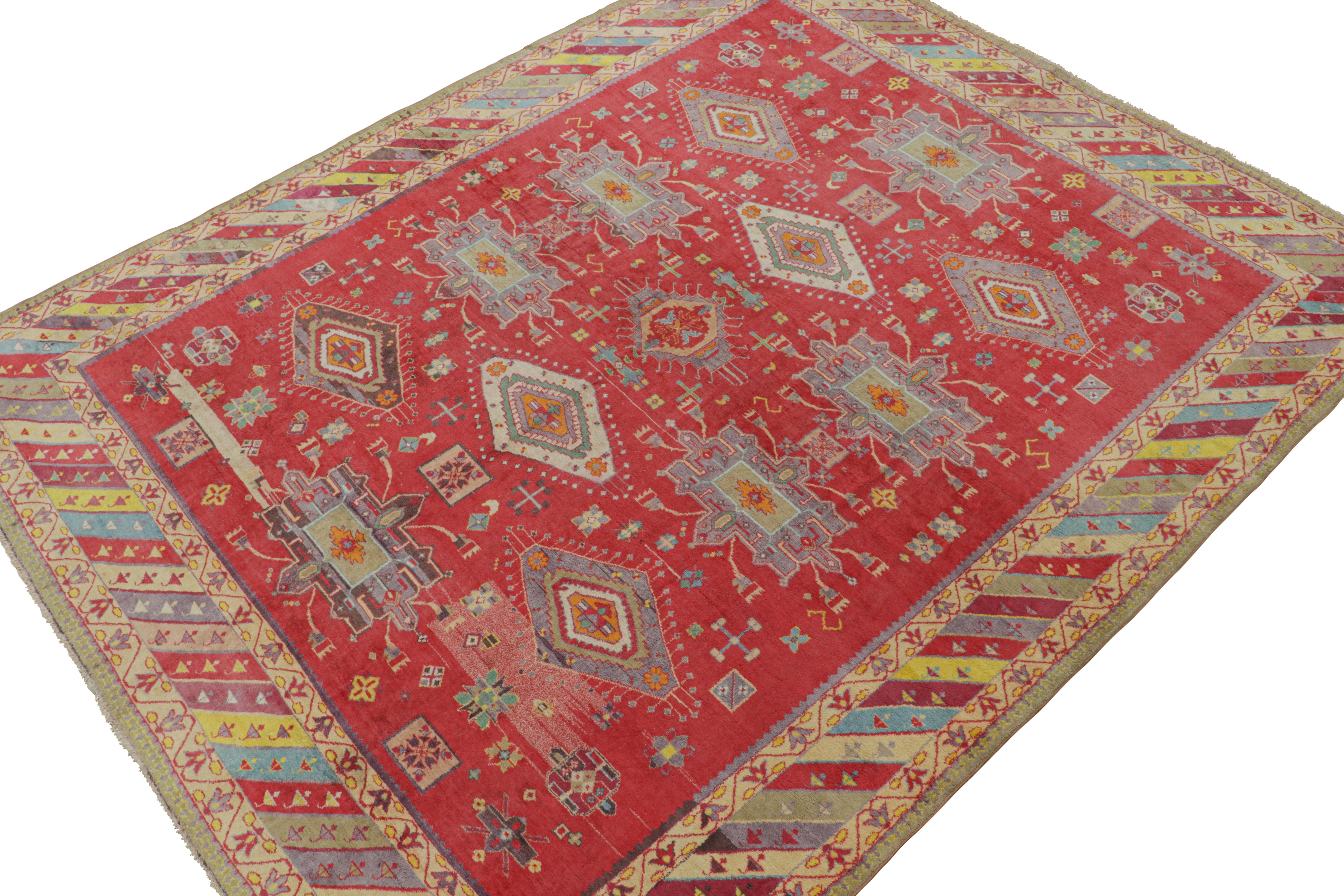 Hand-knotted in cotton and originating from India circa 1920-1930, this 9x12 antique Agra rug is an exciting new curation from Rug & Kilim. 

On the Design: 

Keen eyes will admire the variety of bright and vibrant jewel tones, and the fabulous