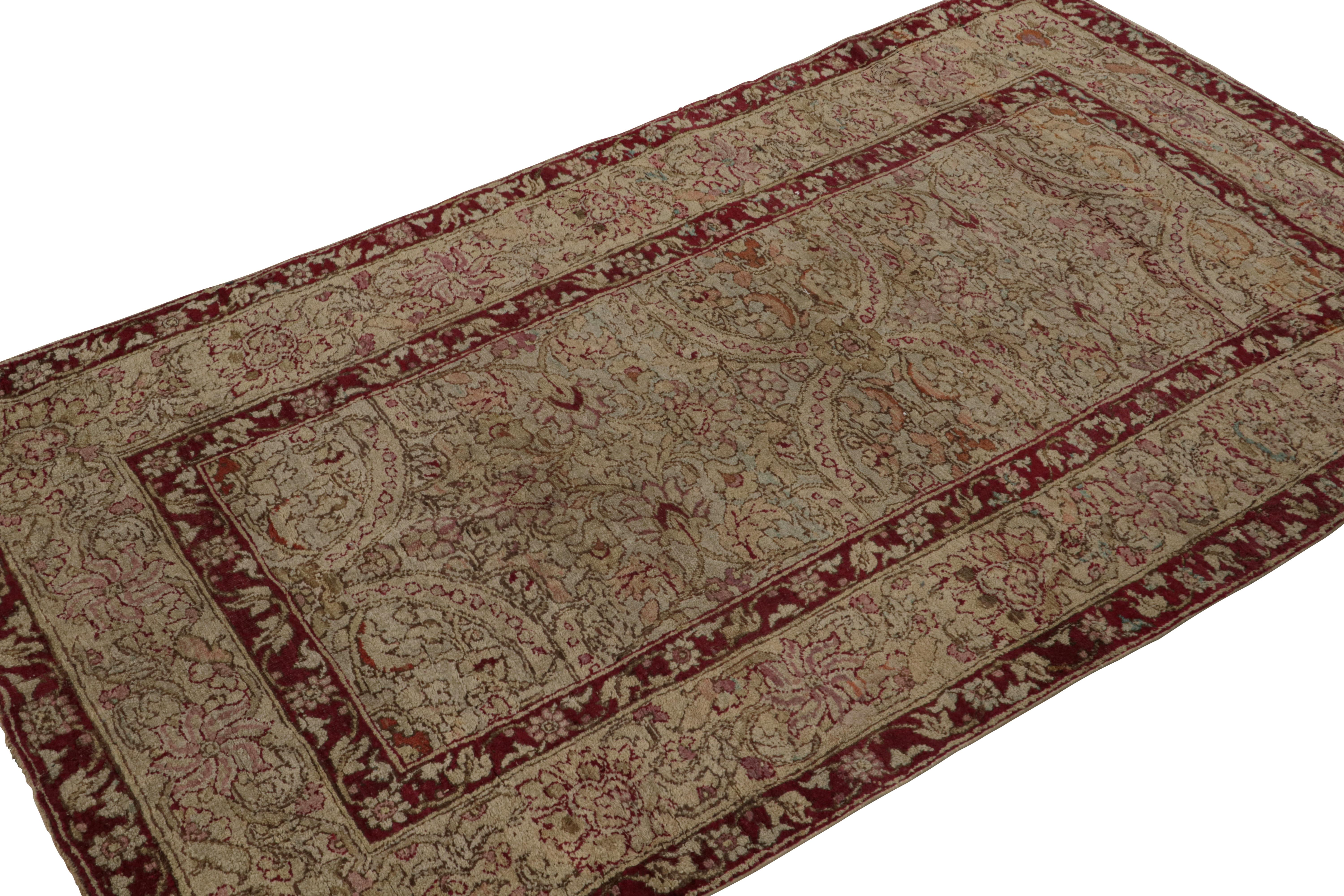 Hand-knotted in wool, circa 1880-1890, originating from India, this 4x6 Antique Agra rug features dense floral patterns in playful colors on a green field with beige and burgundy red borders 

On the Design: 

The intricate craftsmanship and