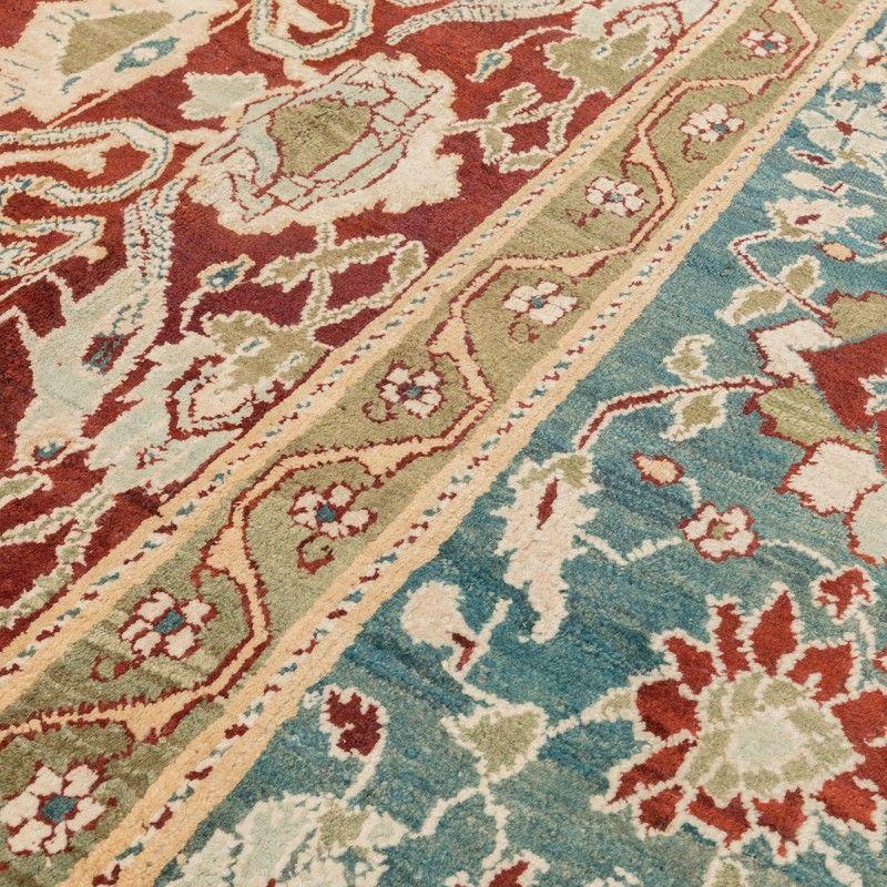 Antique Indian Agra Rug circa 1900

- Carpet characterized by the use of the design of palmettes and floral elements throughout the central field on a red background.

- The rest of the decorative elements follow patterns of floral figures in their