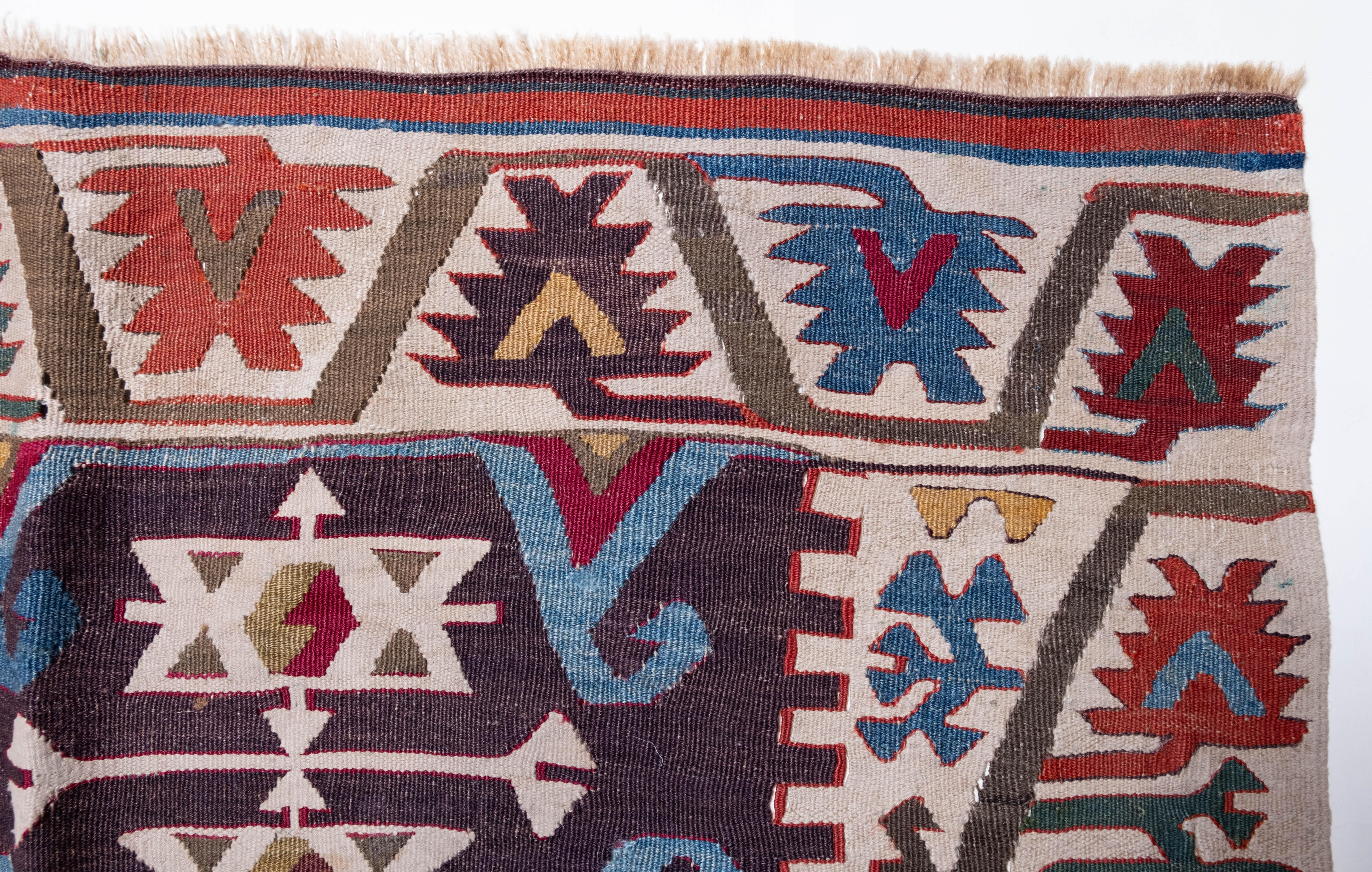 This is Central Anatolian Antique Kilim from the Aksaray region with a rare and beautiful color composition.

The beauty of the dyeing, the quality of the wool (thread), the splendor of the weave, and the age are all present in this old Anatolian