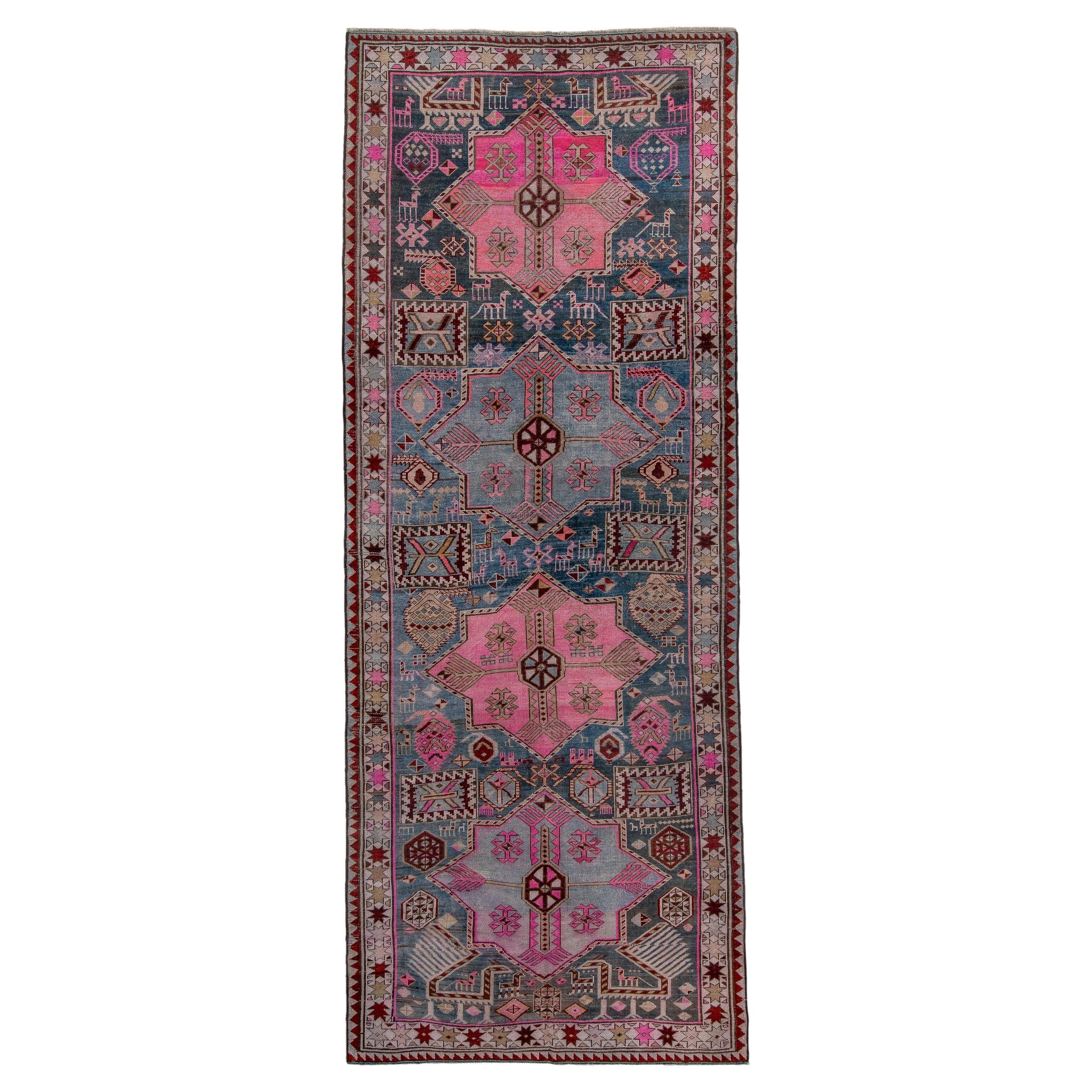 Antique Akstafa Long Rug with Light Blue Field and Shades of Pink  For Sale