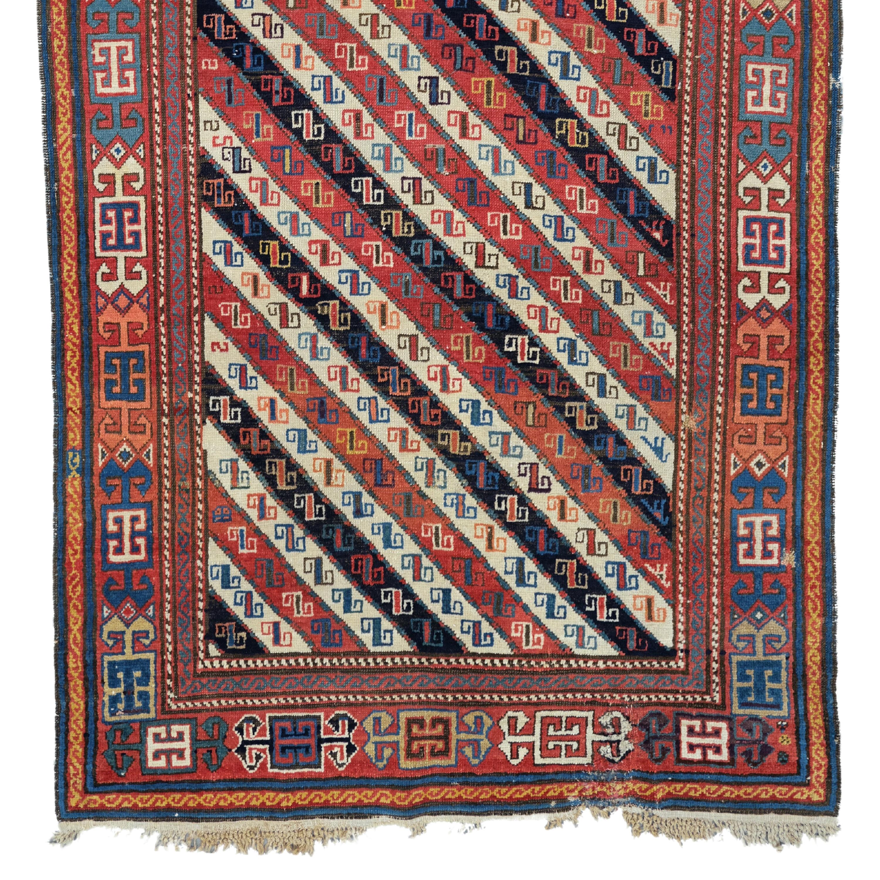 19th Century Caucasian Akstafa Rug

This extraordinary carpet will fascinate you with its intricate designs and vibrant colors that reflect the rich history and craftsmanship of the period. Each stitch tells the story of skilled craftsmen who