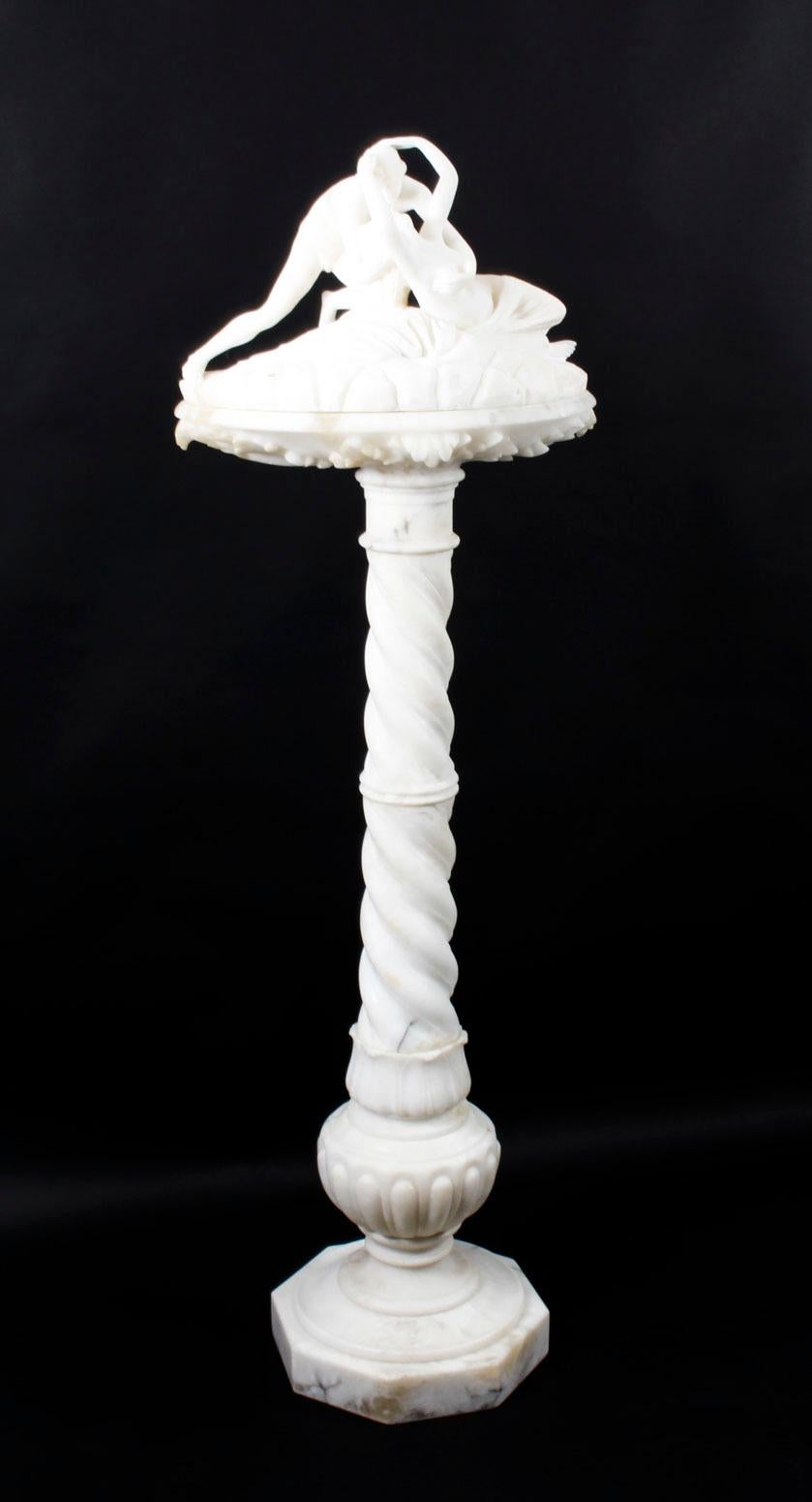 A lovely antique alabaster sculpture, the lovers, after Antonio Canova, raised on it's original alabaster floor standing pedestal, circa 1870 in date.

The beautiful sculpture is made from stunning white alabaster and depicts a pair of embracing
