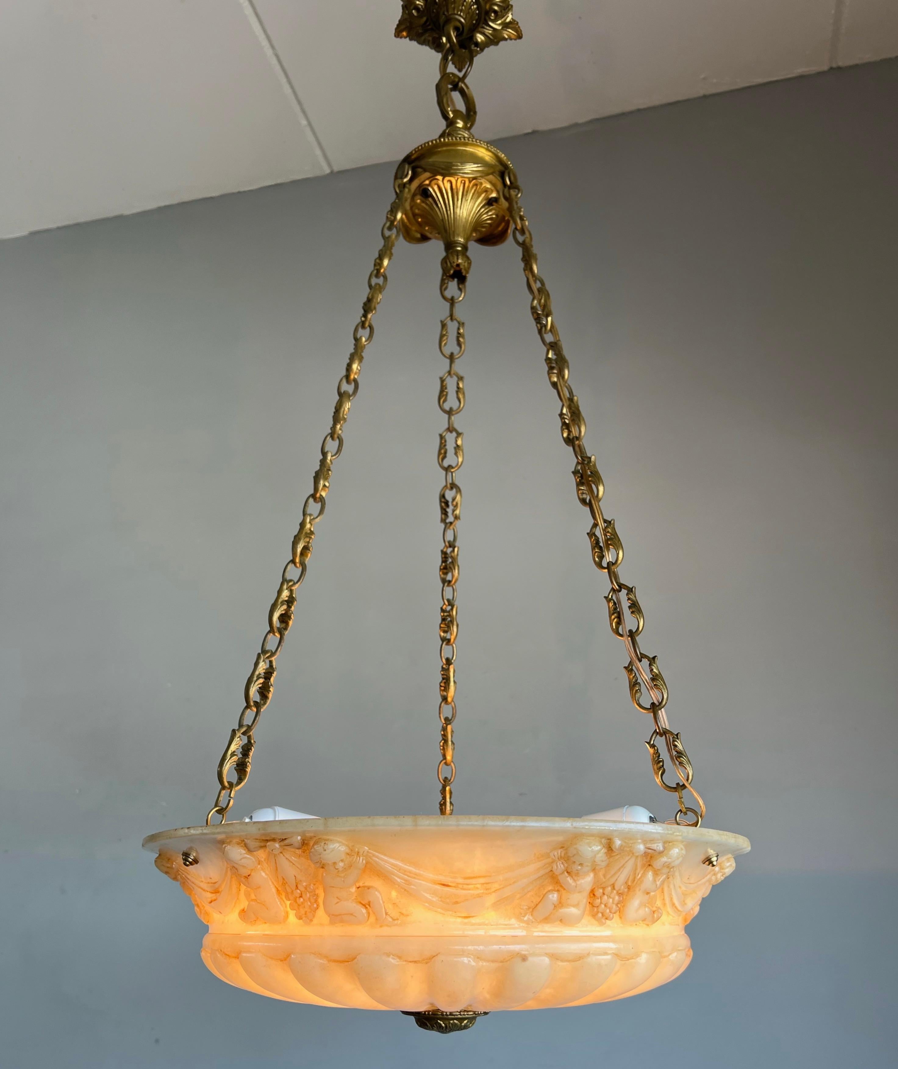 Neoclassical Revival Antique Alabaster Pendant Light with Impressive Hand Carved Putti Decor For Sale