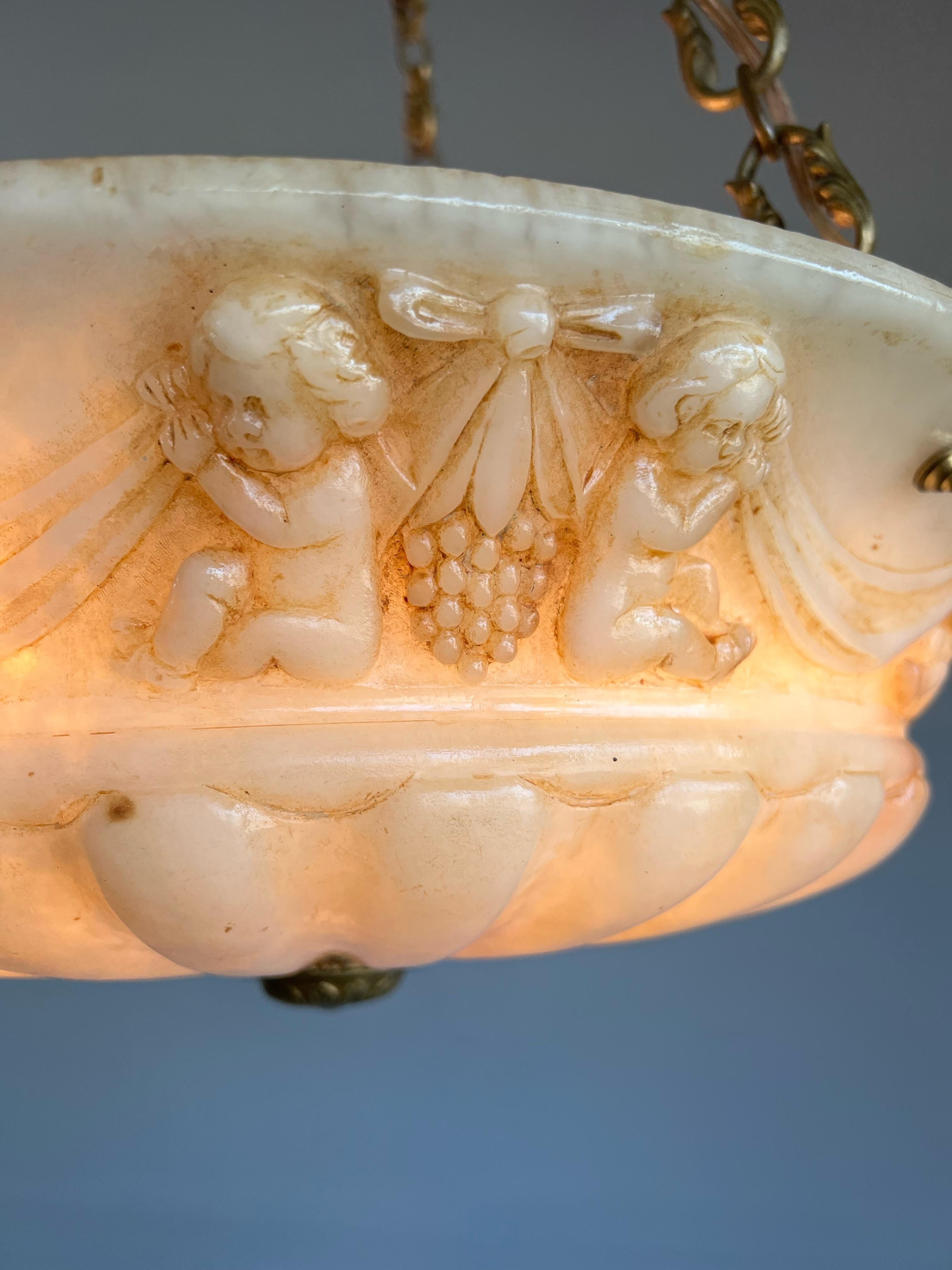 20th Century Antique Alabaster Pendant Light with Impressive Hand Carved Putti Decor For Sale