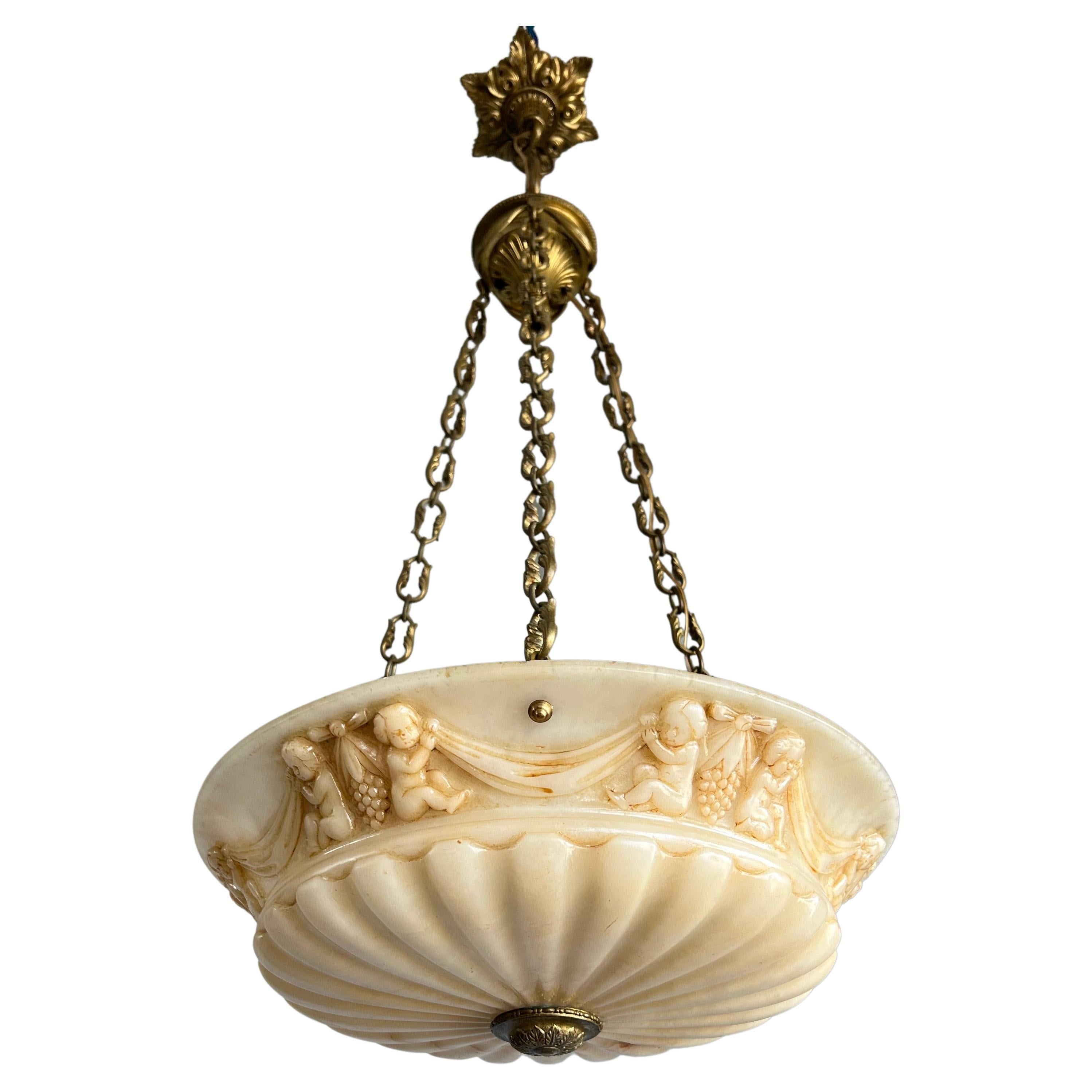 Antique Alabaster Pendant Light with Impressive Hand Carved Putti Decor For Sale