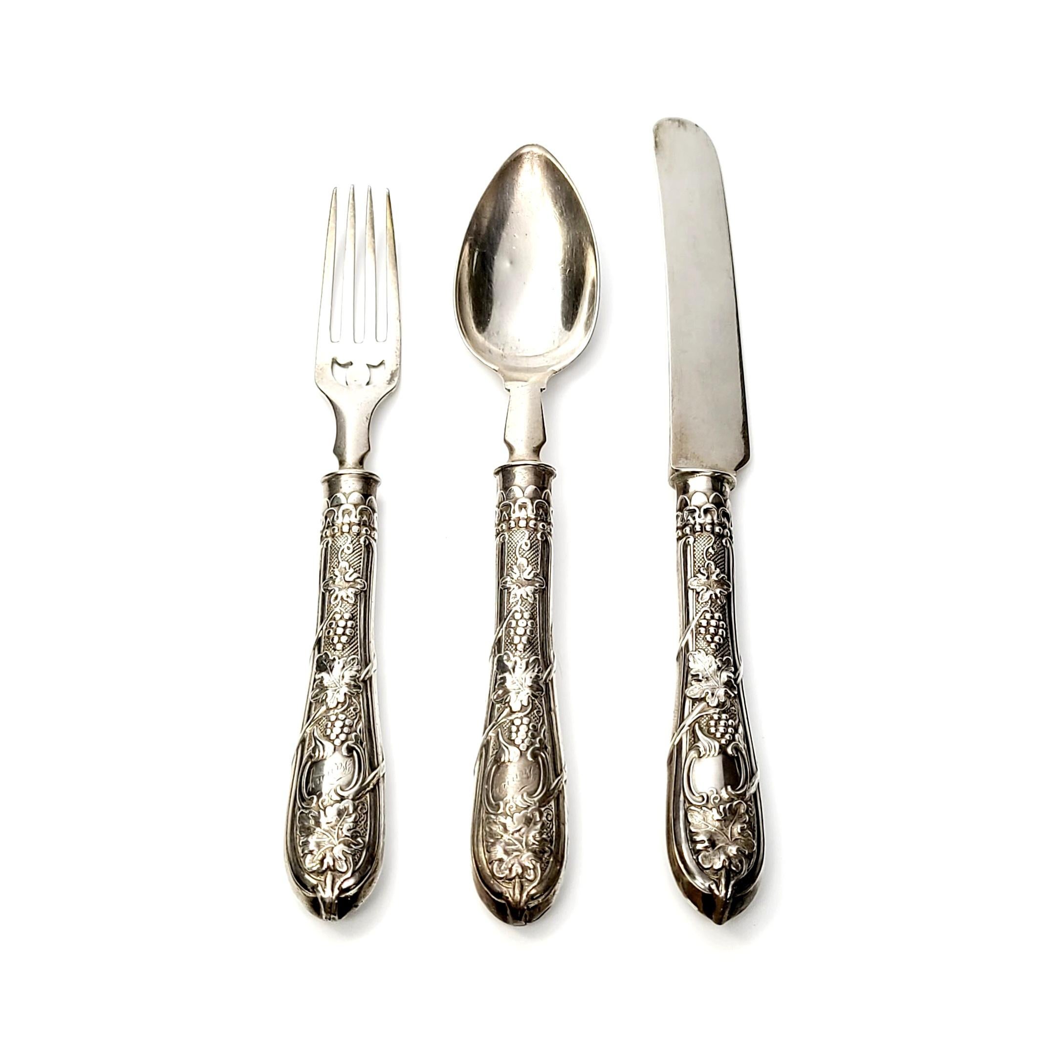 Antique coin silver knife, fork and spoon set by Albert Coles.

Engraved 