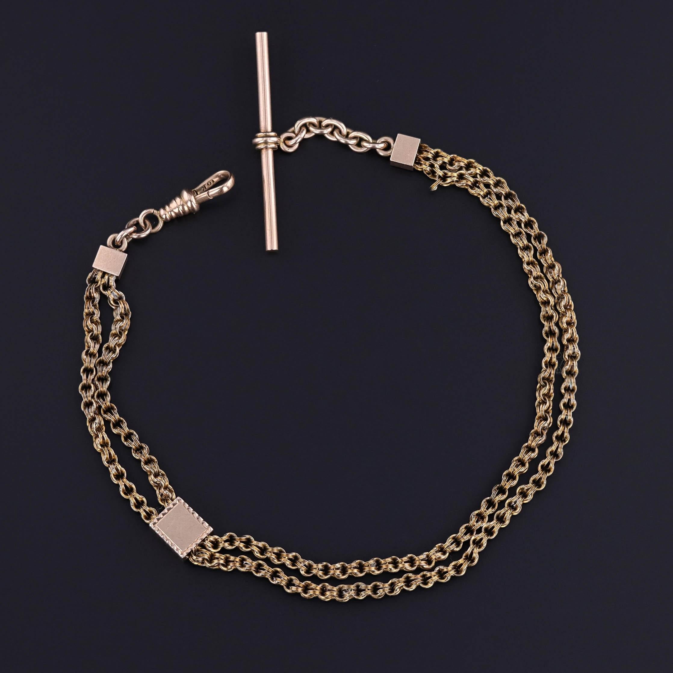 Antique 9ct Gold Albert Watch Chain with Floral Slide (Circa 1890–1900)

A fine example of late Victorian elegance, this antique Albert watch chain dates to circa 1890–1900 and showcases the timeless appeal of warm 9ct gold. Originally intended as a