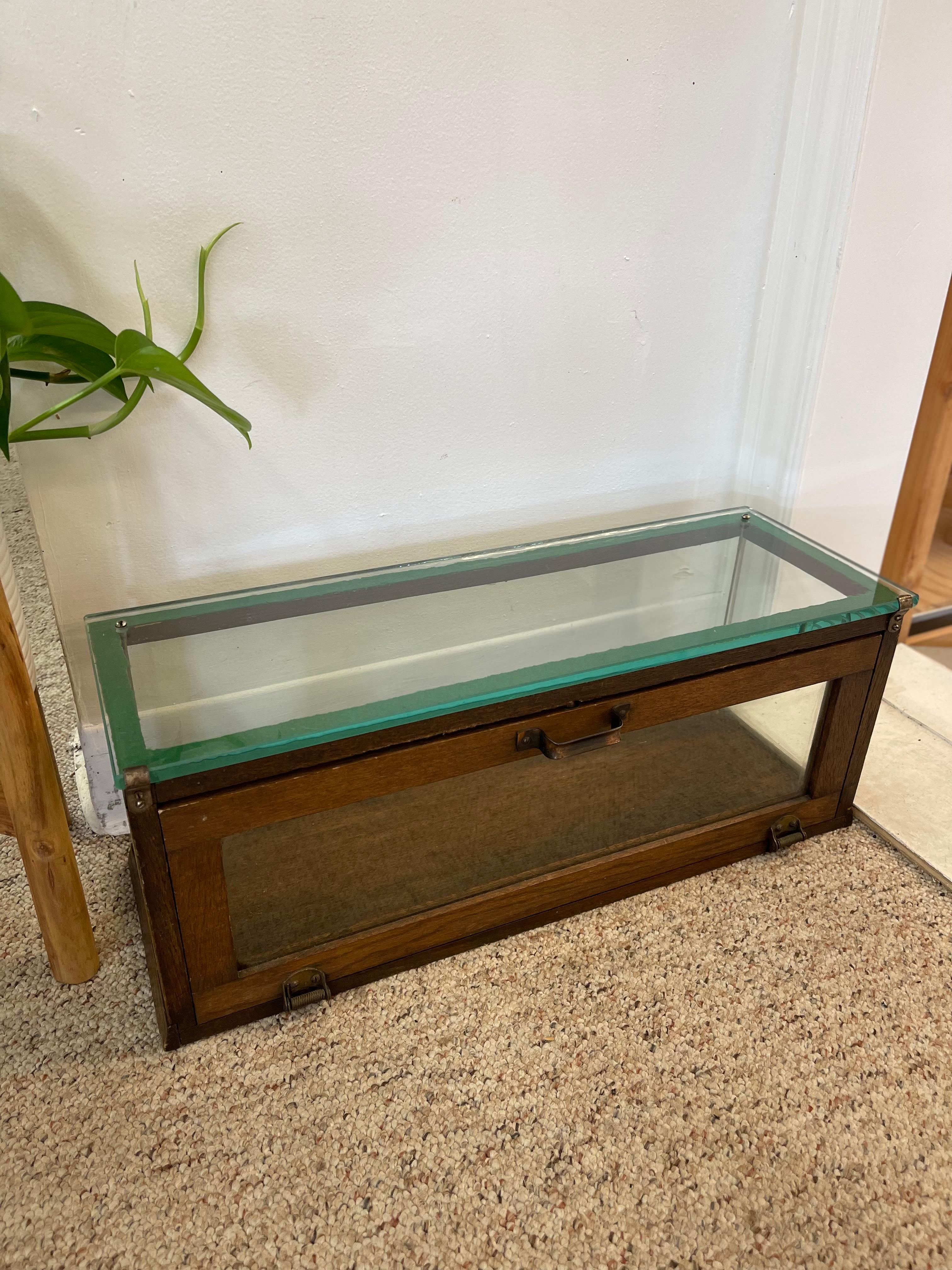 This antique countertop display case was produced by Alfred Noack, a noted early 20th-century maker of 
