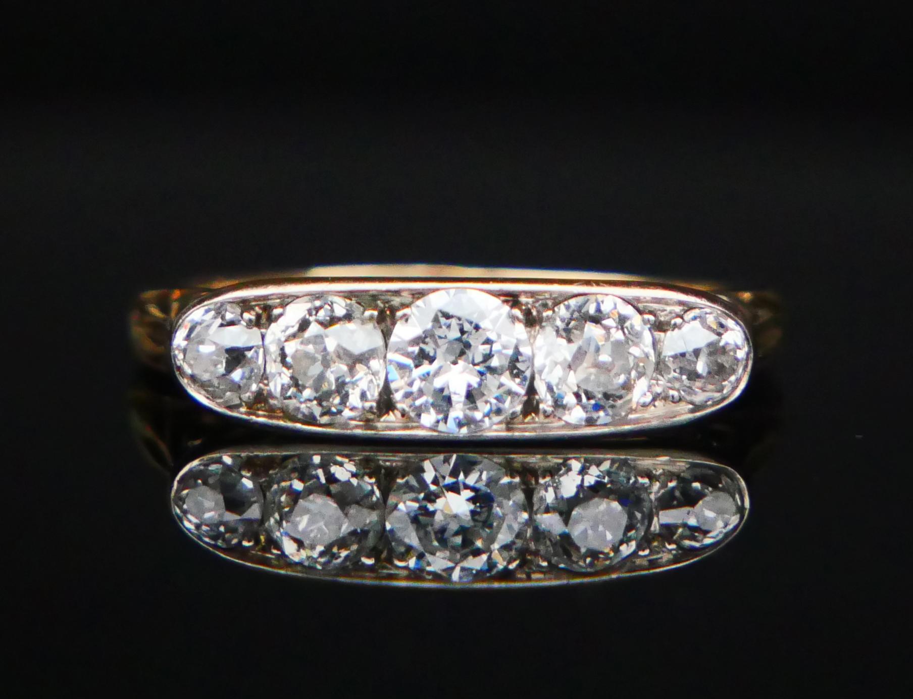Fine old German Alliance 5-stones Ring featuring natural brilliant and old European cut Diamonds mounted in Platinum clusters on solid 18K Yellow  Gold band. Openwork crown is  17 mm x 4.7 mm wide x 4mm deep. The largest Diamond in the center is Ø