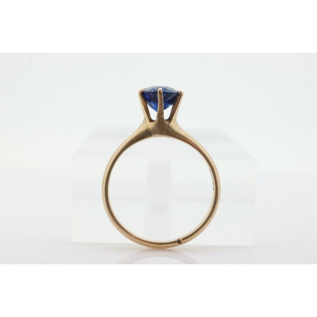 Vintage from the 1920s
Size: 6 US
Materials: Gold
Gemstone: Sapphire
Gem color: Green

Band color: Gold


Allsopp Brothers ring. Antique.

One of a kind ring. Blue sapphire set into victorian claw setting.

Condition: Has not been polished. Gem is
