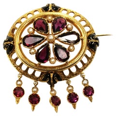 Broche ancienne d'Almandine en or 18 carats et émail noir, Paris, vers 1860