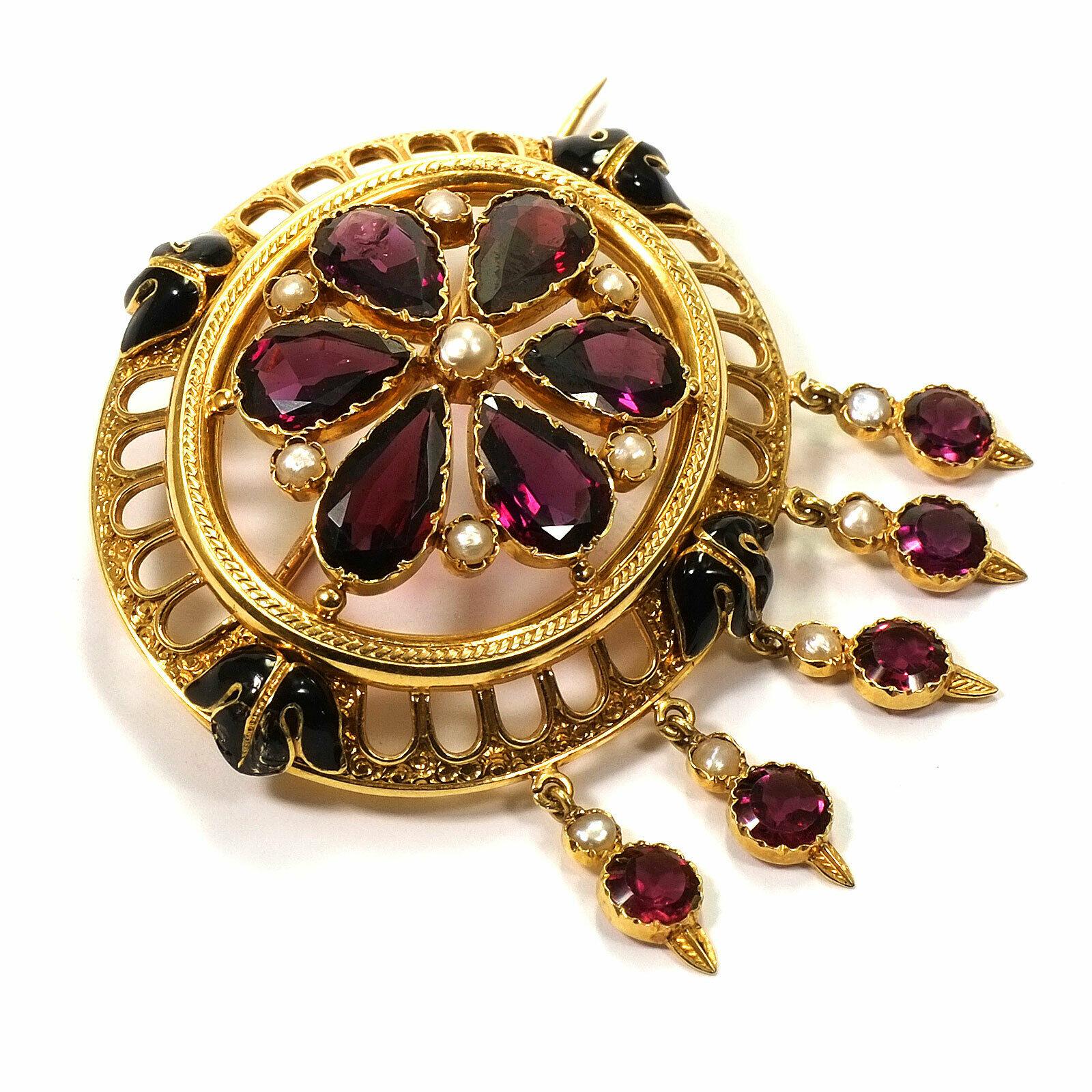 Antique Almandine Black Enamel 18K Gold Brooch, Paris circa 1860

Magnificent brooch made of high-quality, finely chased gold, oval with a lattice-like openwork edge and black enameled leaves, the center cape-shaped set with teardrop-shaped