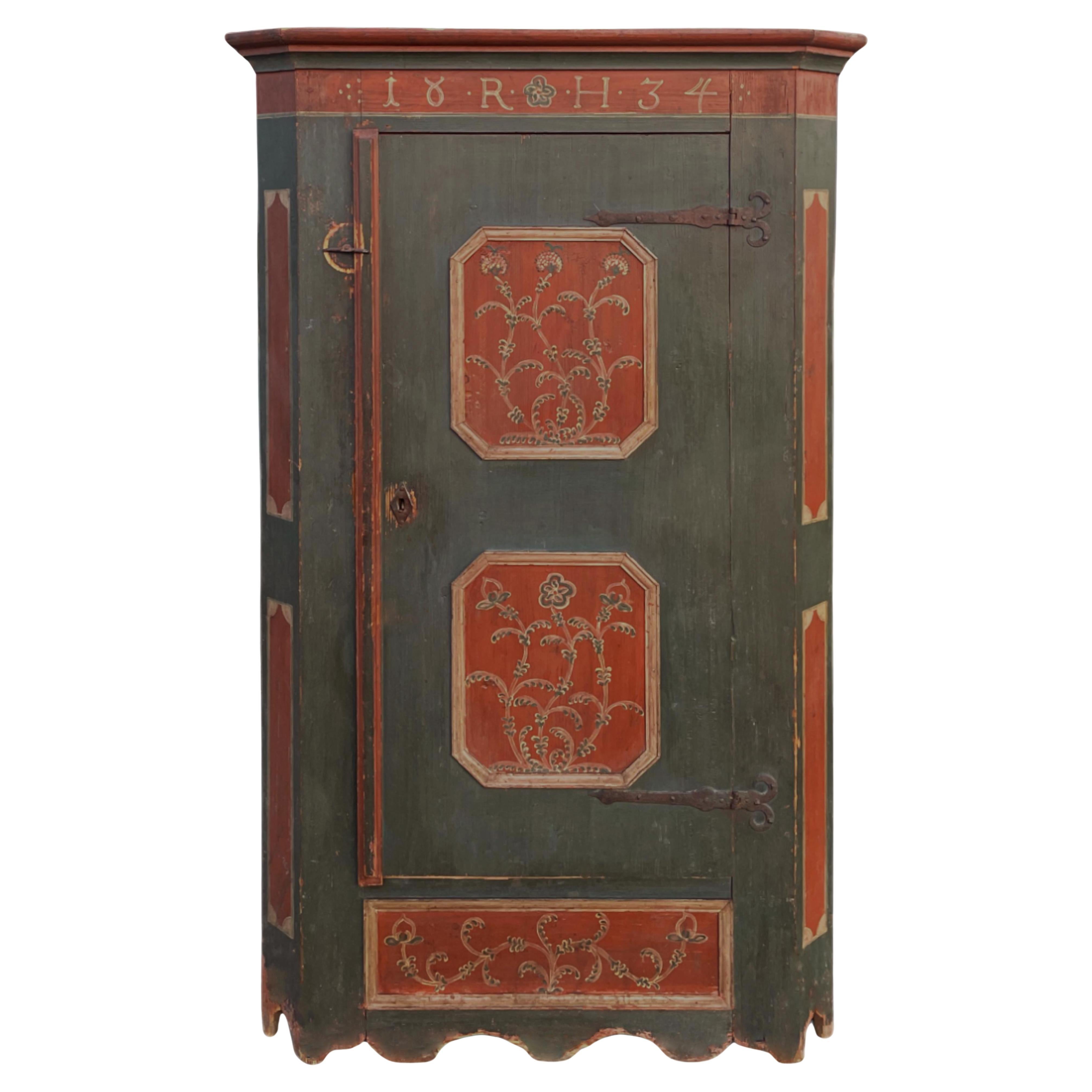 Ancienne armoire peinte des Alpes datée de 1834
