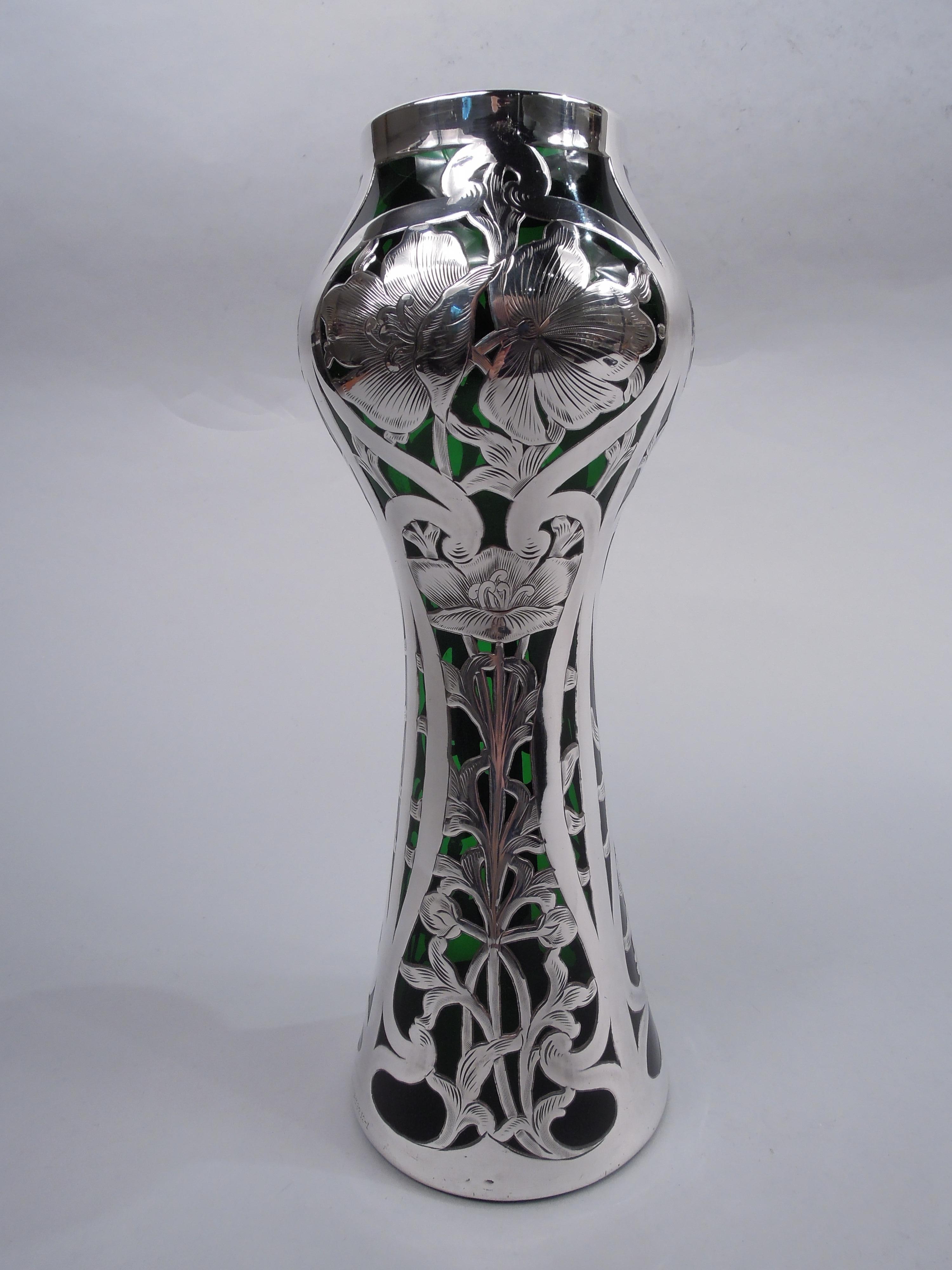Art Nouveau glass vase with engraved silver overlay. Made by Alvin Corp. in Providence, ca 1900. Baluster on cone. Overlay in form of vertical flowering stems overlooking wide and plain scrolled and whiplash frames. Silver fully marked including