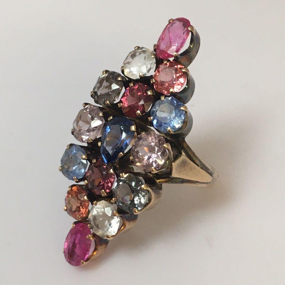 Antique American 14k Yellow Gold Multicolor natural Sapphire lozenge Ring

Edwardian era, American made
Marked 'K14’ , Acid tested 14K gold
15 pieces of approximate 1/2 Carat each Sapphire of different colors approximate total stone weight 7.5