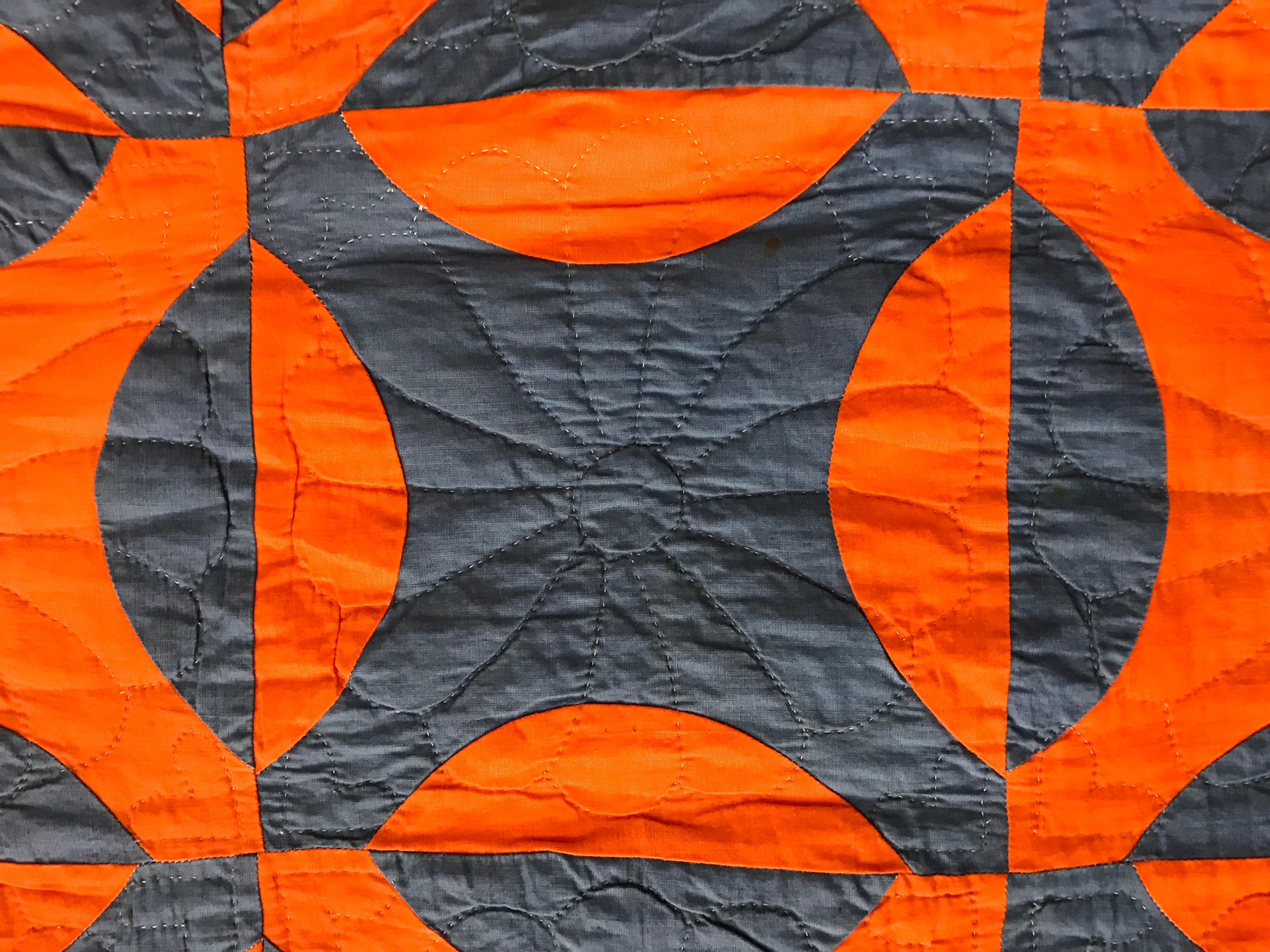 orange and blue quilt
