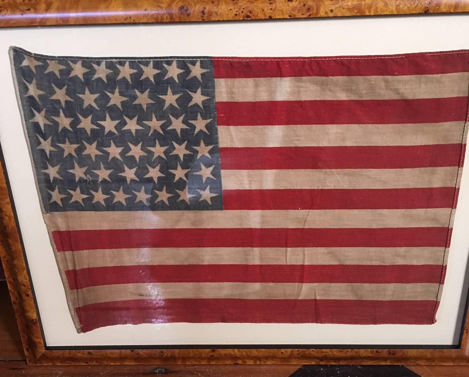 Antique American parade flag with 46 stars, made when 