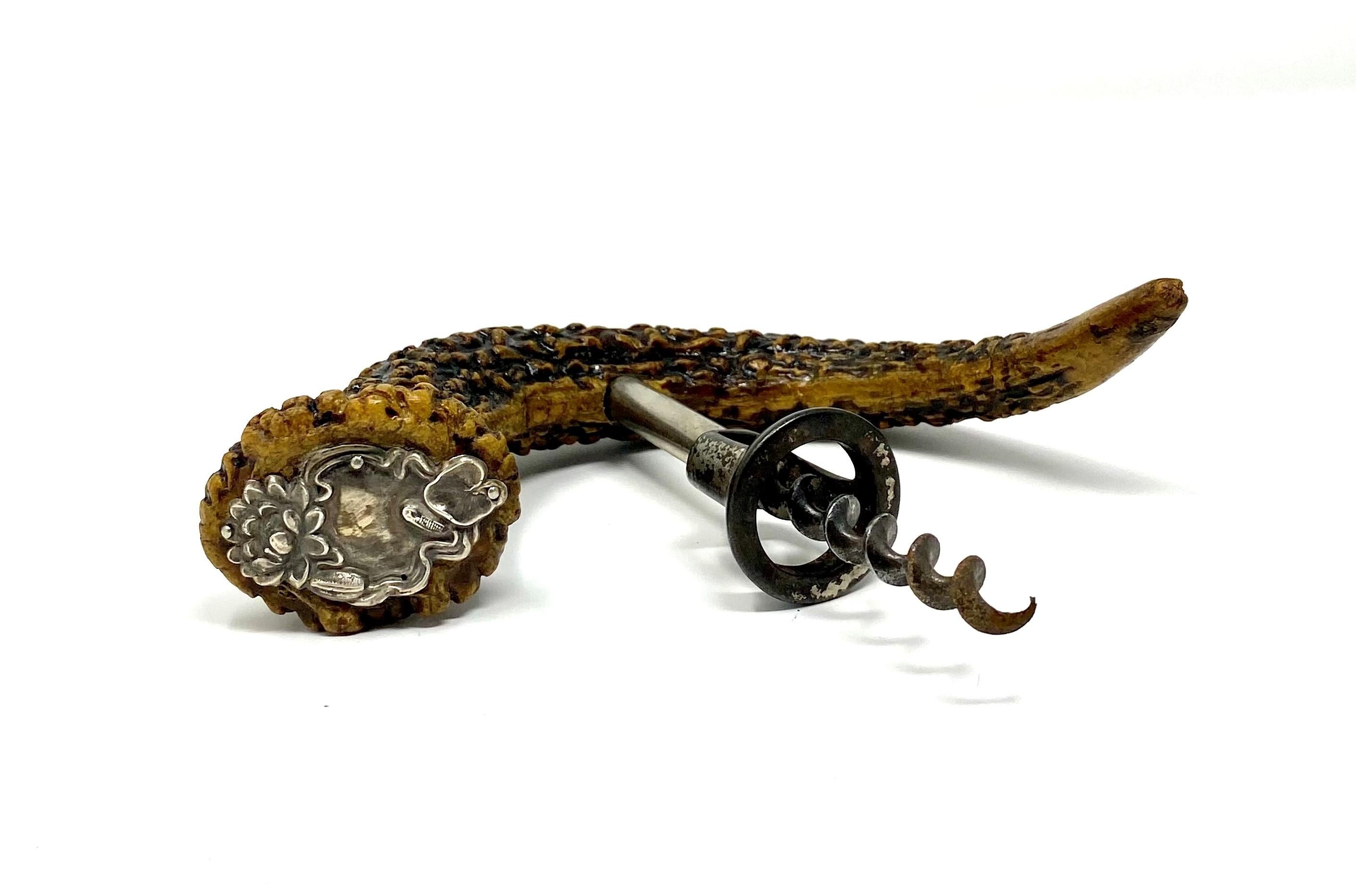 Antique American antler corkscrew with sterling silver mount, circa 1900.