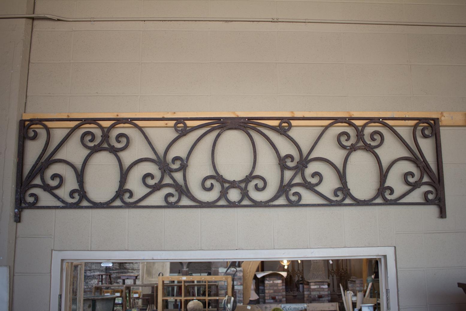 Substantial Arts & Crafts wrought iron transom from Chicago. Beautiful scroll work and patina.