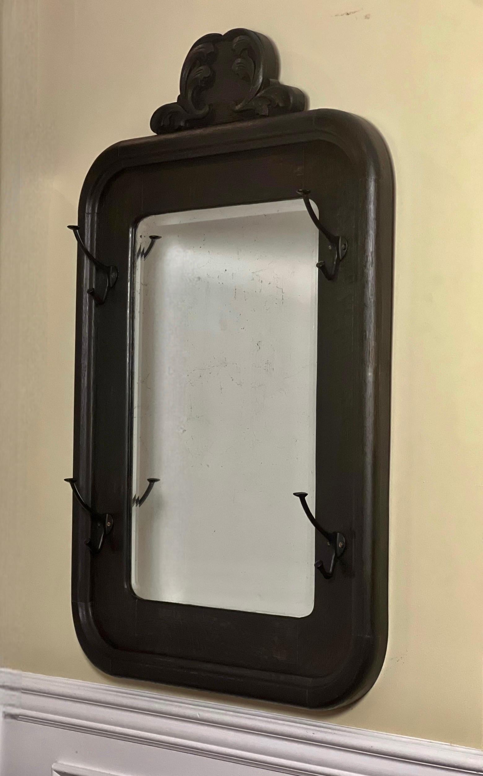 North American Antique American Black Stained Oak Wall Coat Rack with Large Beveled Mirror For Sale