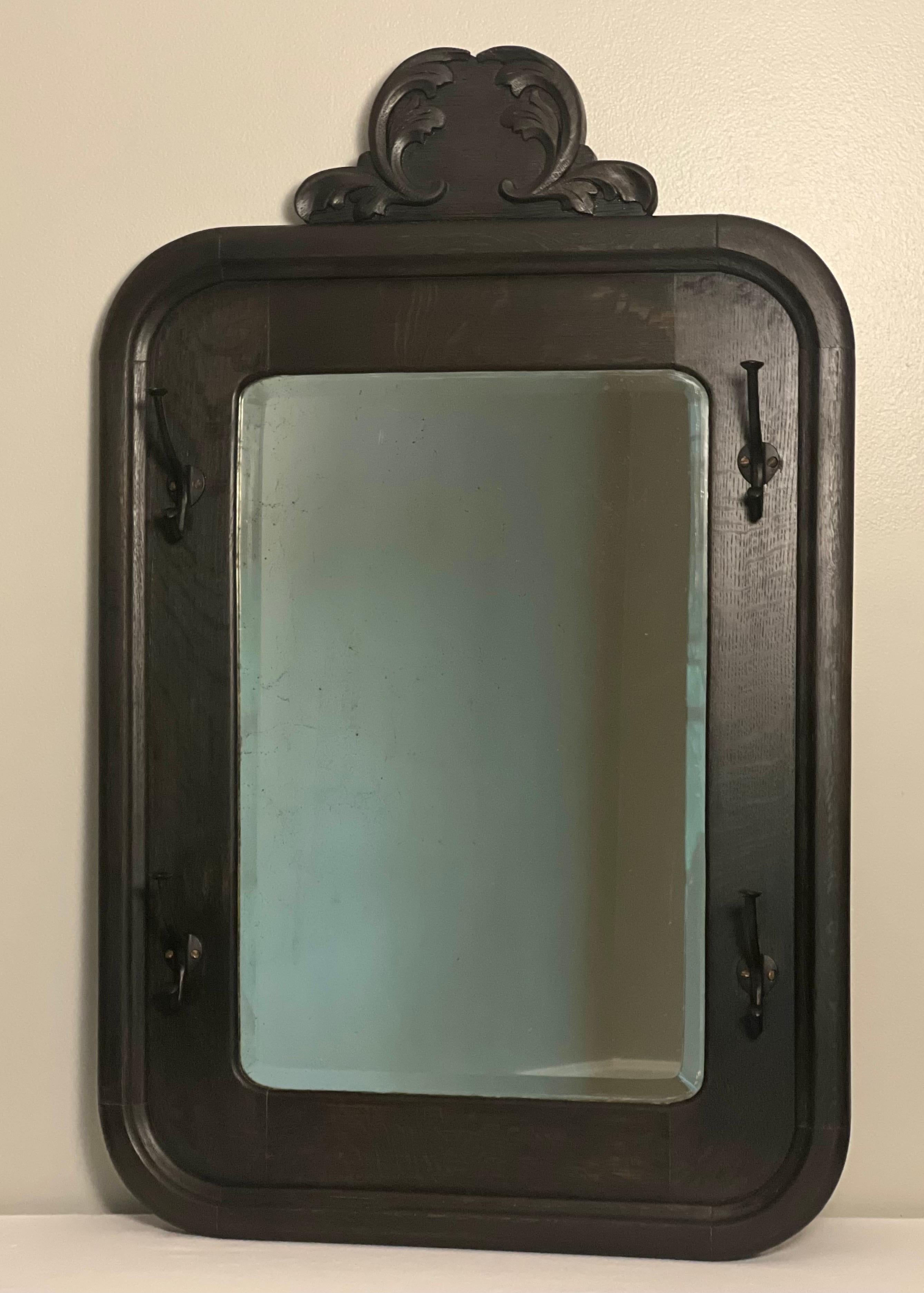 Hand-Crafted Antique American Black Stained Oak Wall Coat Rack with Large Beveled Mirror For Sale