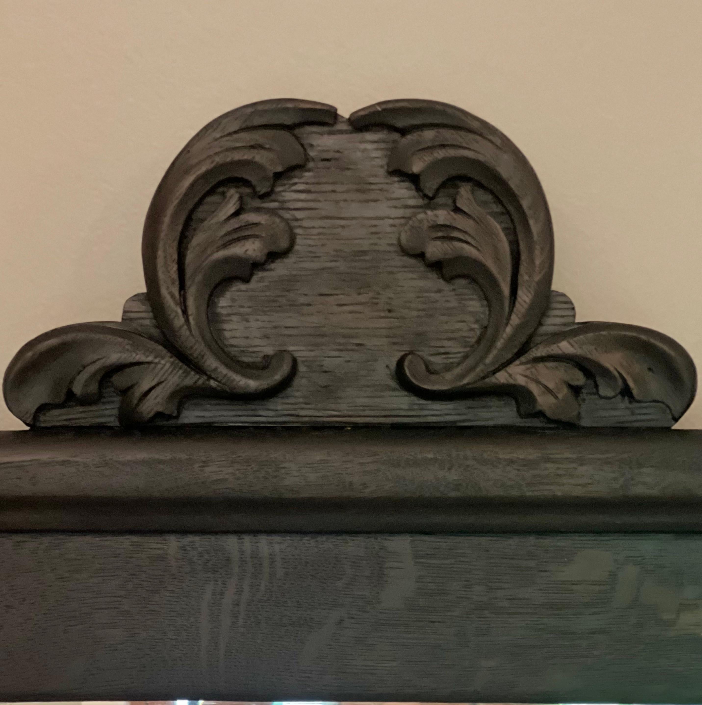 Antique American Black Stained Oak Wall Coat Rack with Large Beveled Mirror In Good Condition For Sale In Doylestown, PA