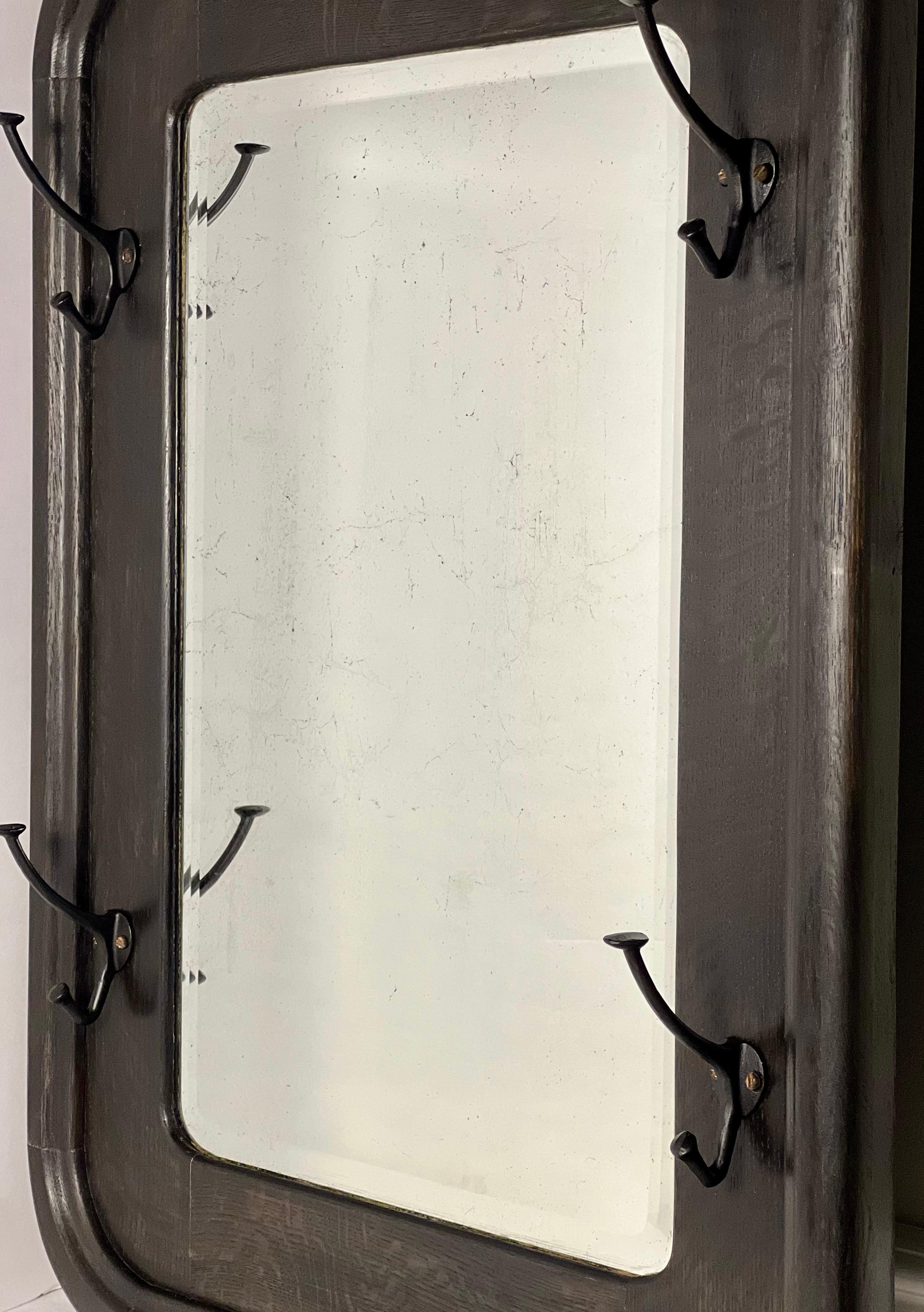 Antique American Black Stained Oak Wall Coat Rack with Large Beveled Mirror For Sale 1