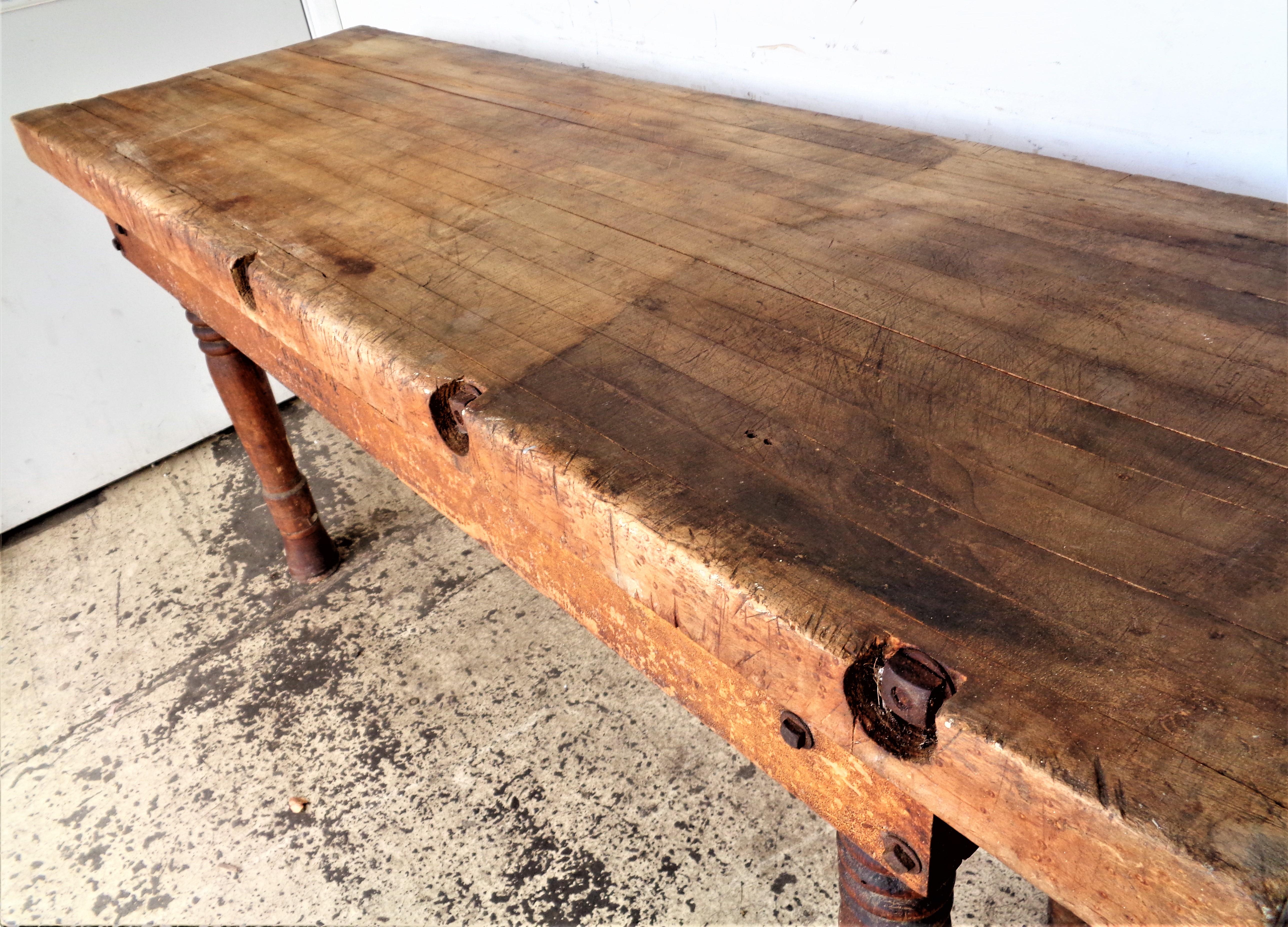 Large and long genuine antique butcher block work table in all original beautifully aged as found condition. Once used in a long closed butchers shop in the city of Rochester, New York. Stamped signed on both upper side rails, Central Supply House