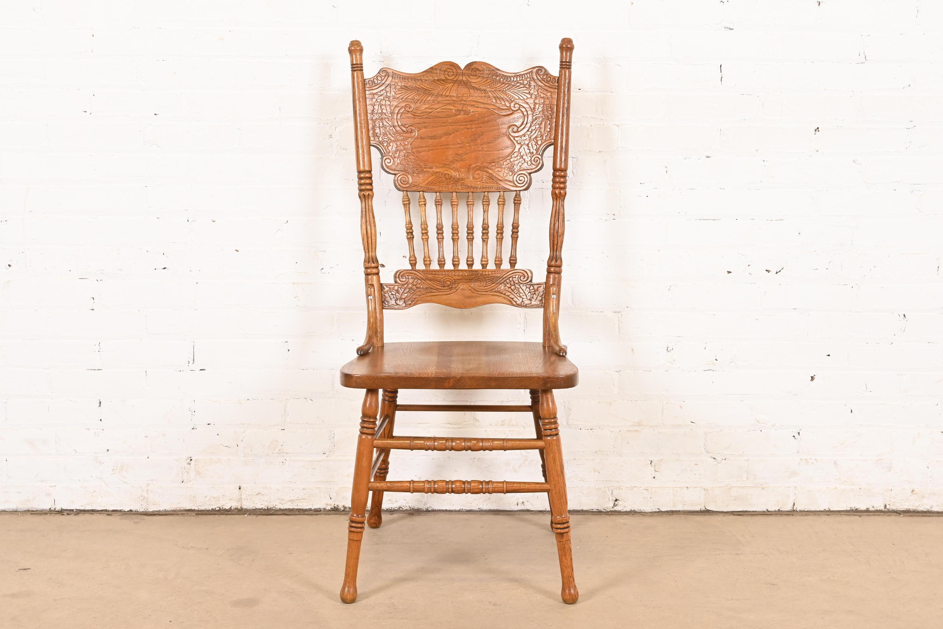 American Classical Antique American Carved Oak Pressed Back Spindle Dining Chair or Side Chair