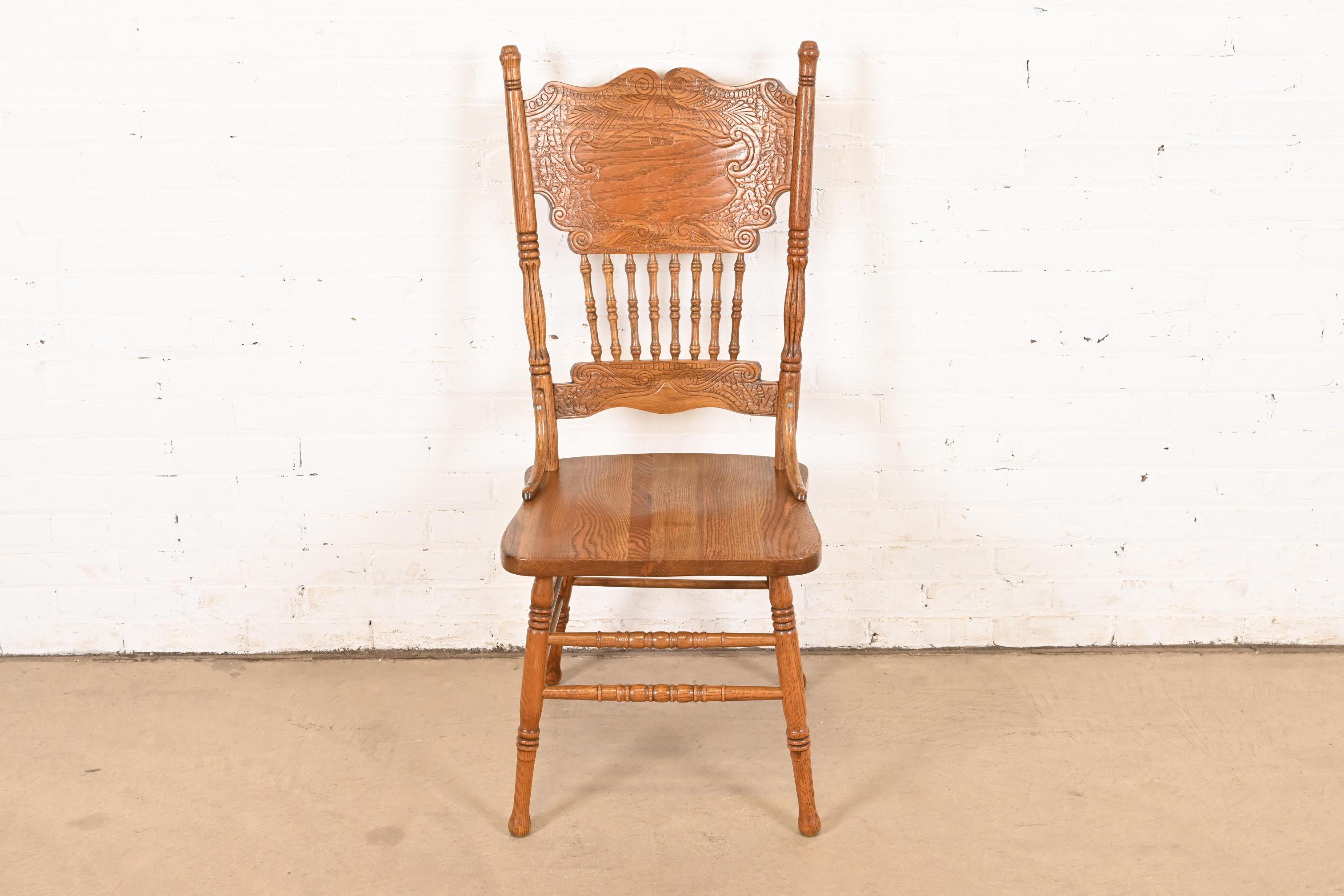 Antique American Carved Oak Pressed Back Spindle Dining Chair or Side Chair In Good Condition In South Bend, IN