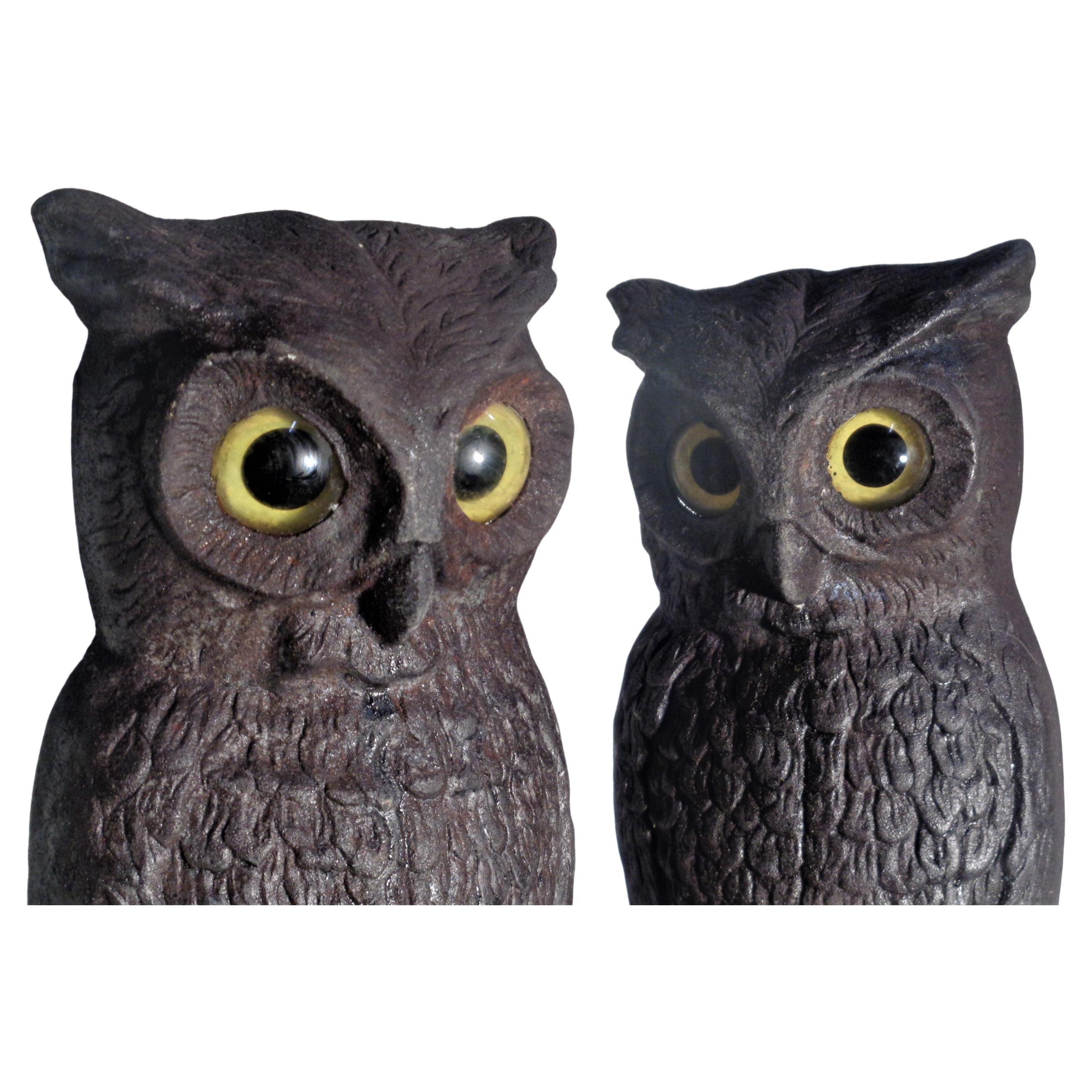 Antique American cast iron owl andirons. Owls w/ original glass eyes. Signed on inside back of owls / signed on the fire dogs. Circa 1900. Measure 15