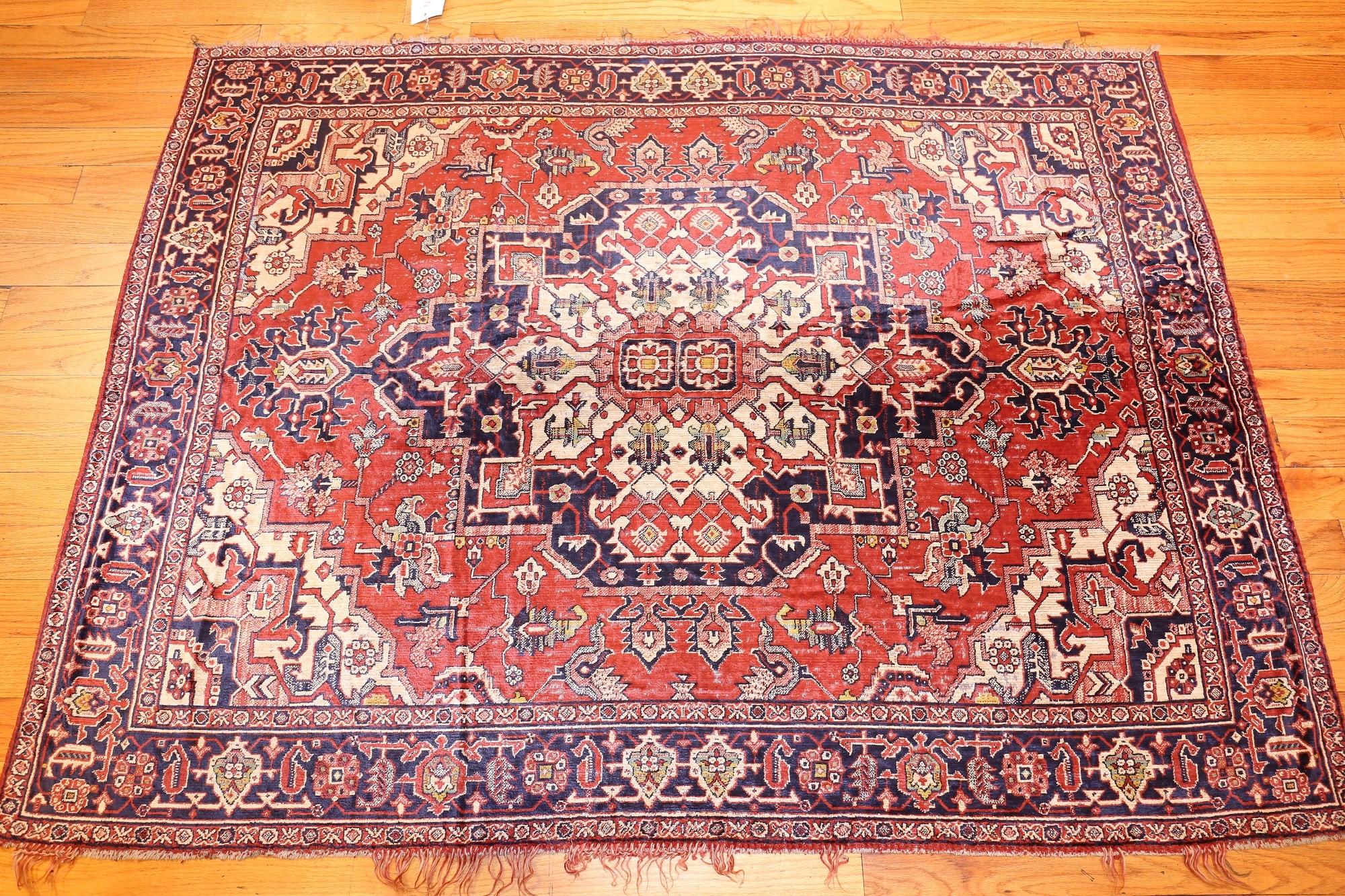 Antique American chenille rug, country of origin: America. Size: 4 ft 7 in x 6 ft (1.4 m x 1.83 m). 

Featuring a dominant coppery-red field with a contrasting medallion, this carpet is an excellent example of the stepped lozenge medallion and