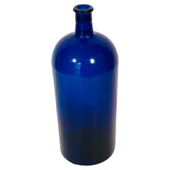 Ancienne bouteille américaine en verre bleu cobalt 14".