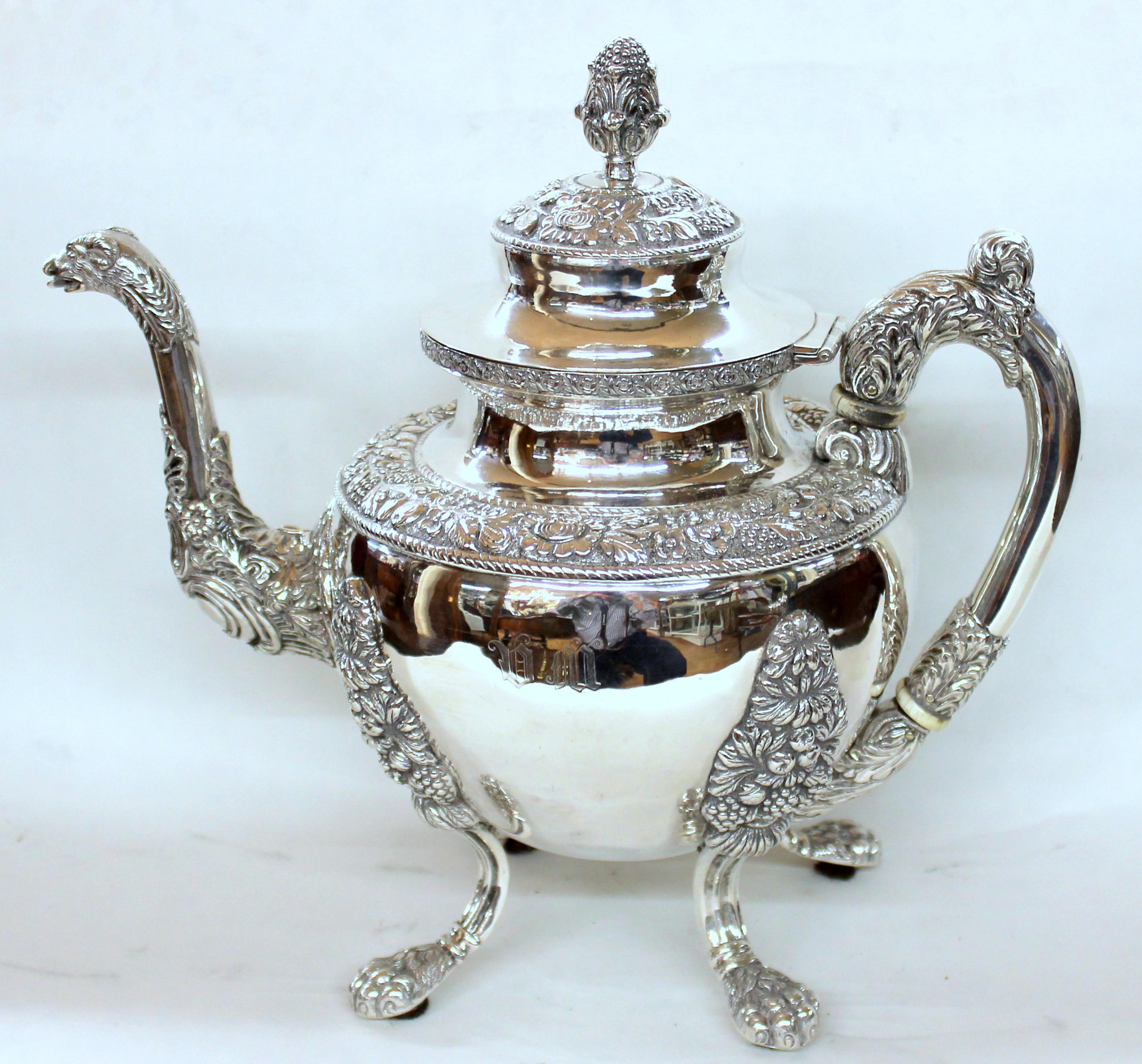 Rare and important antique American very heavyweight coin silver (.900 fine) rococo style four piece tea set including exceptional teapot, two handled covered sugar bowl, cream jug and waste bowl.

Maker: Andrew de Milt, New York

Please note the