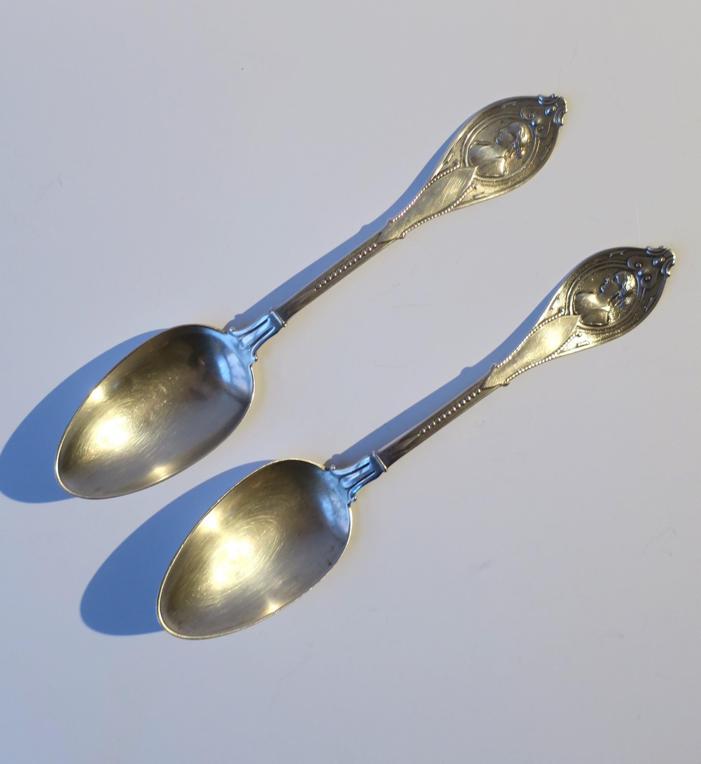 A beautiful antique American coin silver serving spoon set by J H Heller & Son, circa late-19th century, USA. Set is in the Victorian design style with hints of Art Nouveau on back of spoon as shown in images. Spoons are a matching set with great