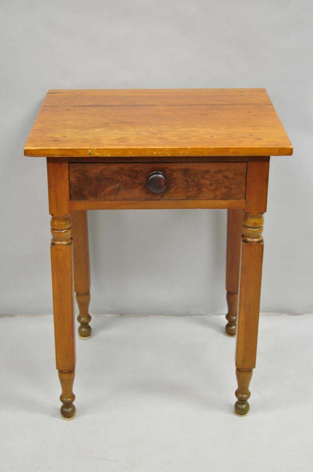 Antique American Colonial Cherry Wood Nightstand Work Side Table with Turn Carved Legs and Single Dovetailed Drawer. Circa Late 19th Century. Measurements: 28.5