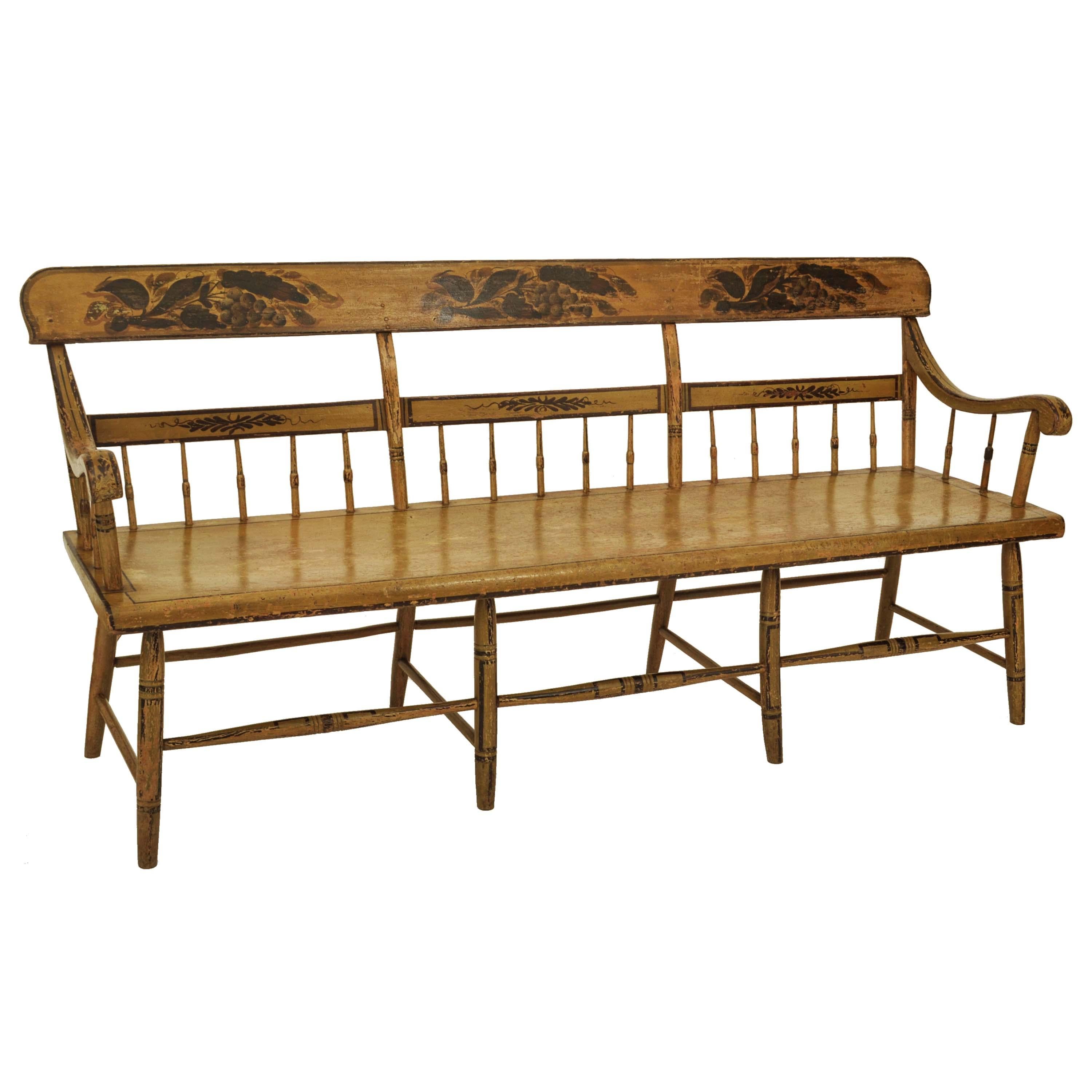 Fine & rare antique American half-spindled Federal period painted & stenciled Windsor bench/settee, Baltimore, Circa 1820.
A rare bench with the original chrome yellow painted and grapevine stenciling, the back rest with three grapevine painted