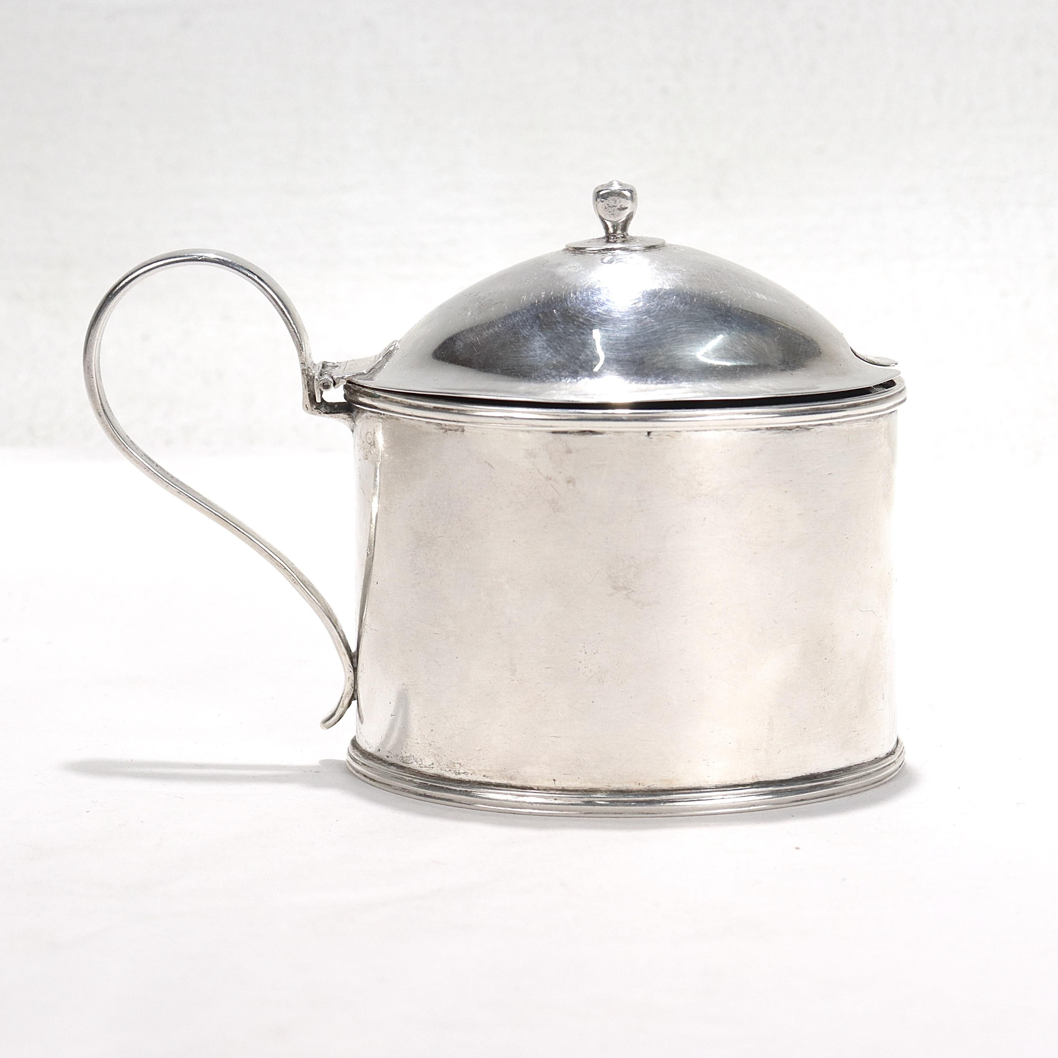 A fine antique silver mustard pot.

Attributed to John Mcfarlane of Phila., PA., or John McMullin of Phila., PA.

The interior and base of the pot is a removable cobalt glass insert.

Simply a great mustard pot!

Date:
18th