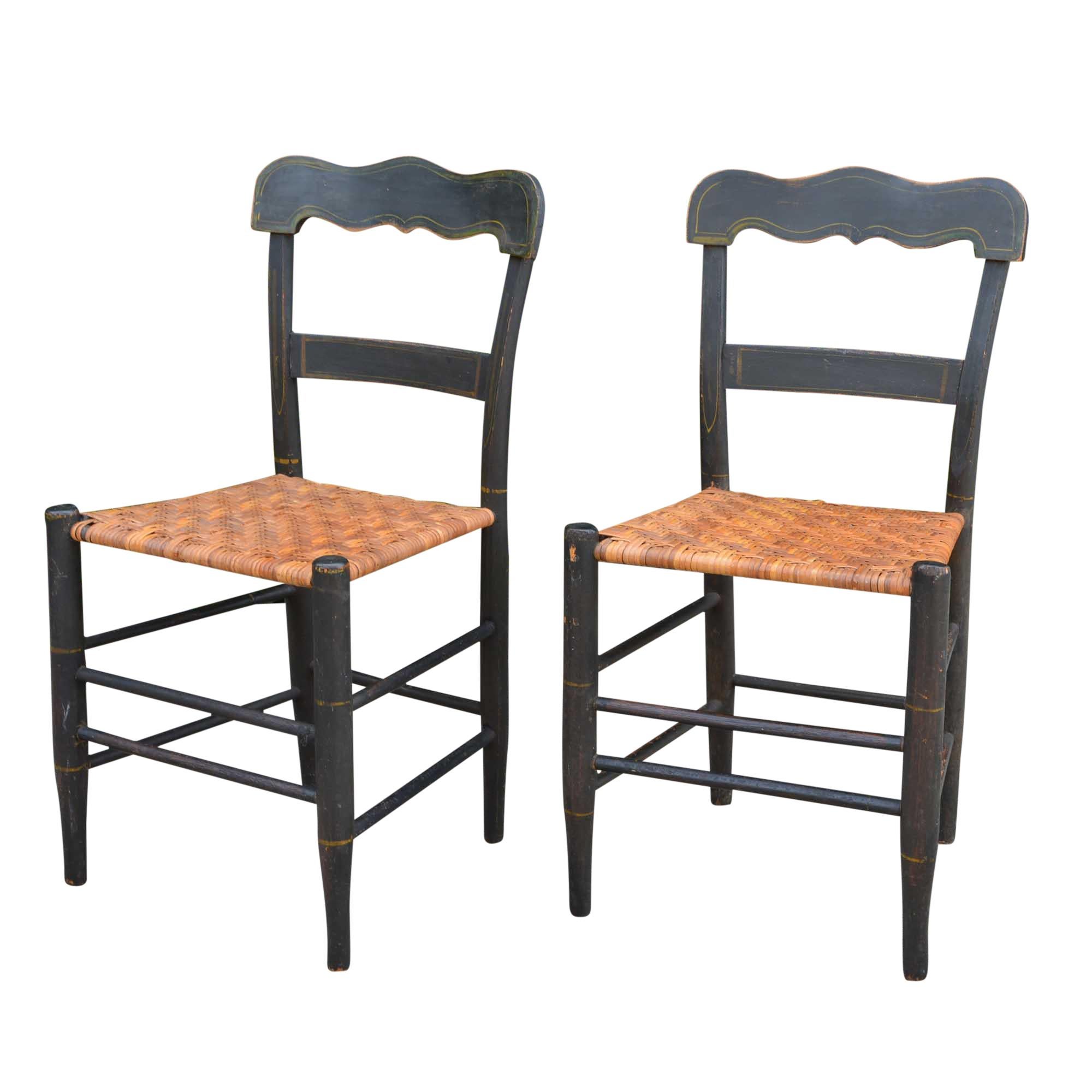 These chairs came from an estate in the village of Granville, Ohio. The caned seats have been really well cared for and are in excellent condition. The frames are painted black with a hand-painted design on the back supports.

For those not
