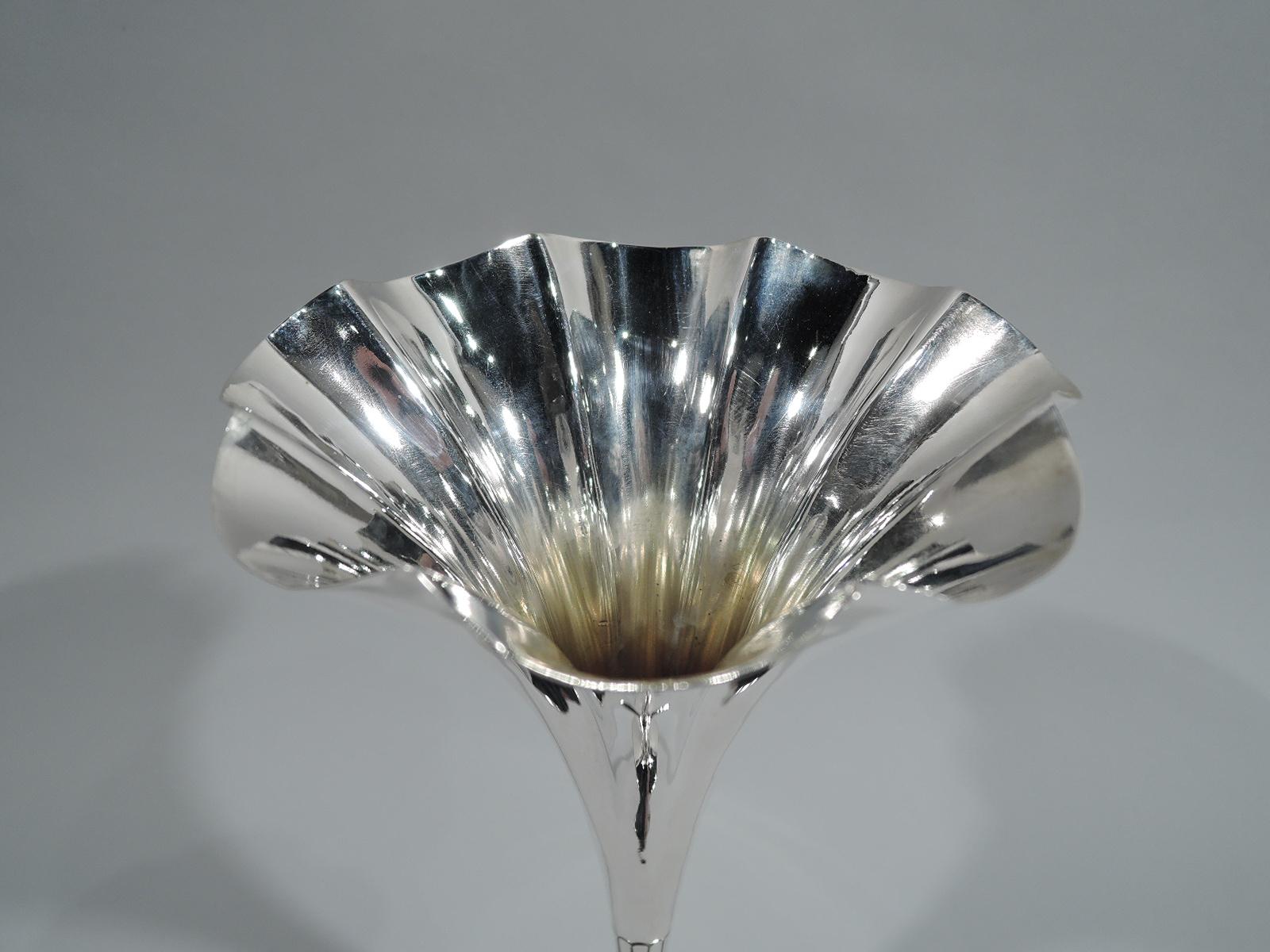 Edwardian sterling silver vase. Made by Tiffany & Co. in New York. Elongated cone on small dome set in flat circular foot. Flutes and applied beads. Fully marked including pattern no. 11908 and director’s letter T (1892-1902). Weight: 7 troy ounces.