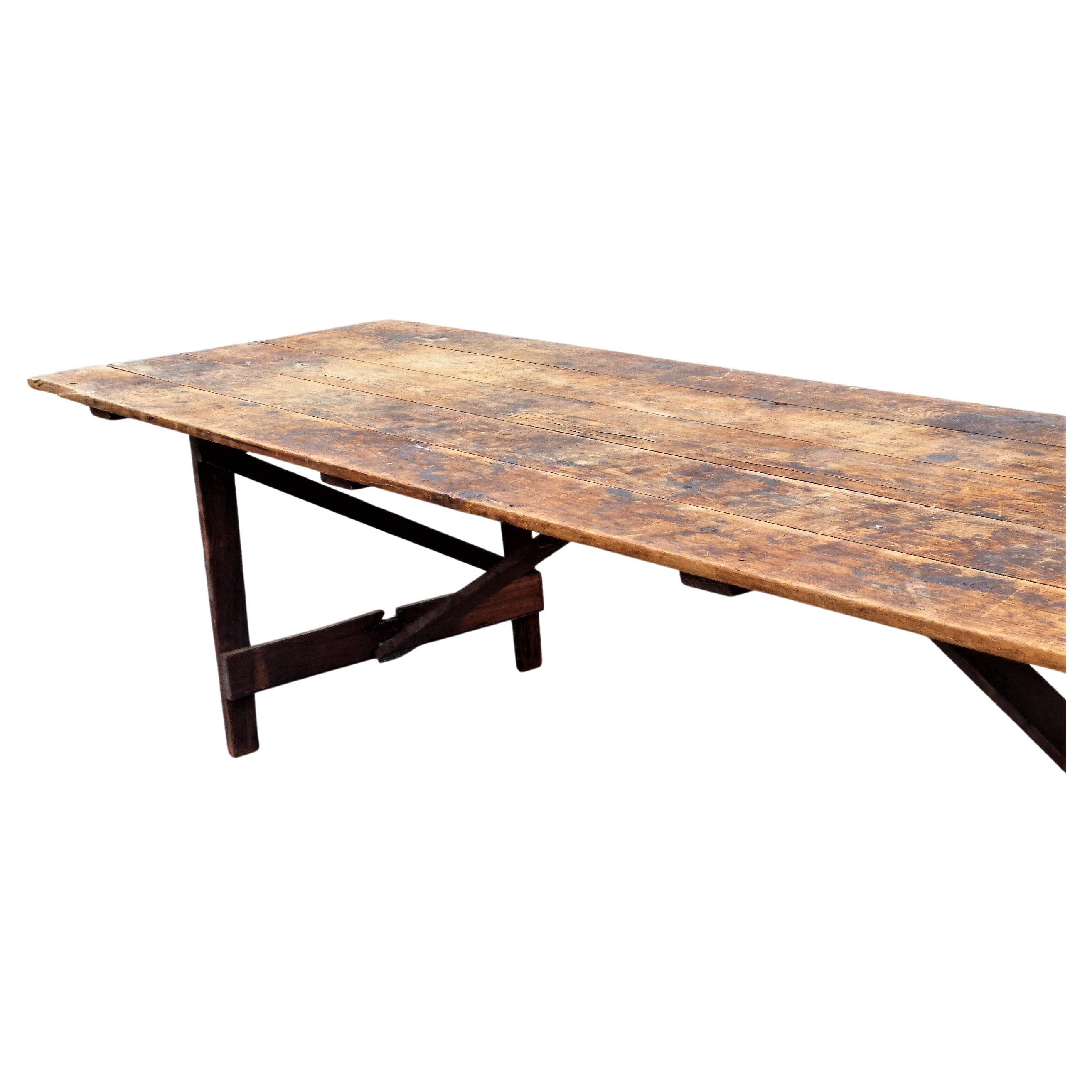 Antique American grange farm harvest table with fold up legs. Overall perfectly aged original undisturbed surface color patina. Structurally rock solid strong with no wobble. Measures 132 inches long x 36 inches wide x 28 inches high w/ the top