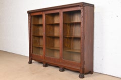 Antique American Empire Carved Oak Triple Bookcase, circa 1890s