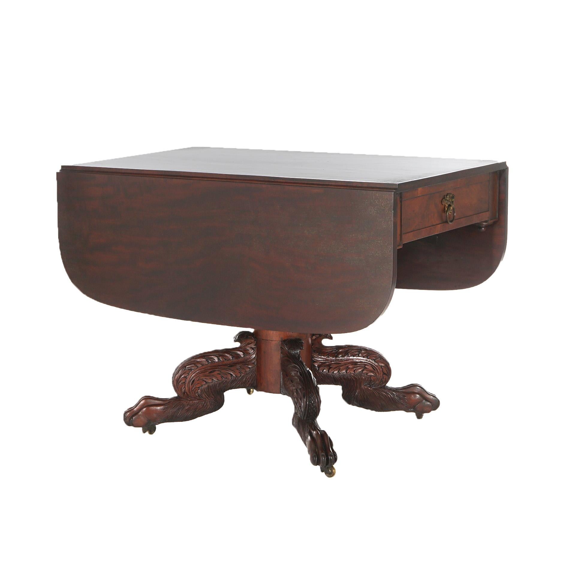 ***Ask About Reduced In-House Delivery Rates - Reliable Professional Service & Fully Insured***

Antique American Empire Classical Carved Mahogany Drop Leaf Table with Single Drawer and Carved Paw Feet

Measures - 28.25