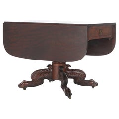 Antique American Empire Classical Carved Mahogany Drop Leaf Table with Paw Feet